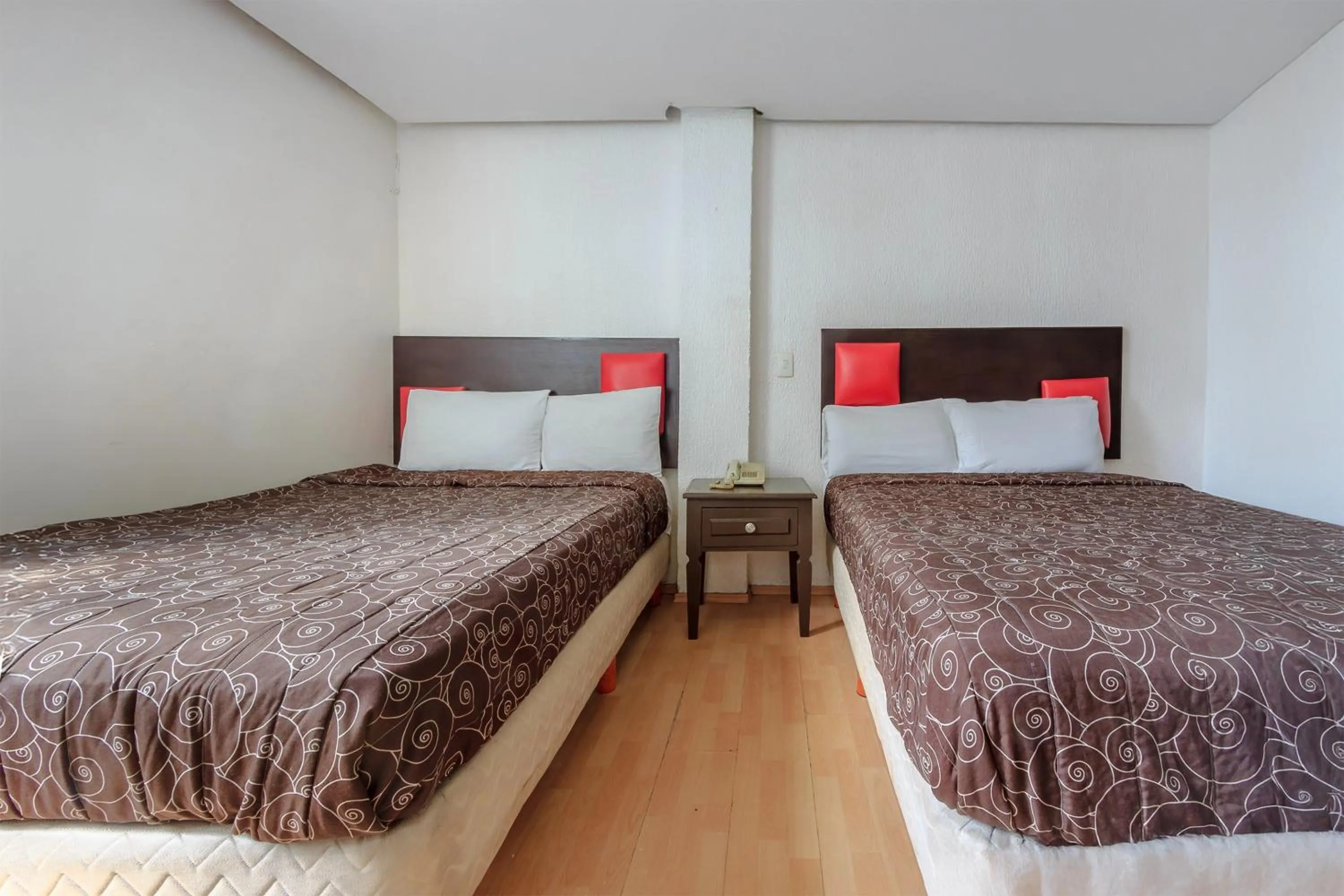 Bedroom, Bed in OYO Hotel Colon Express