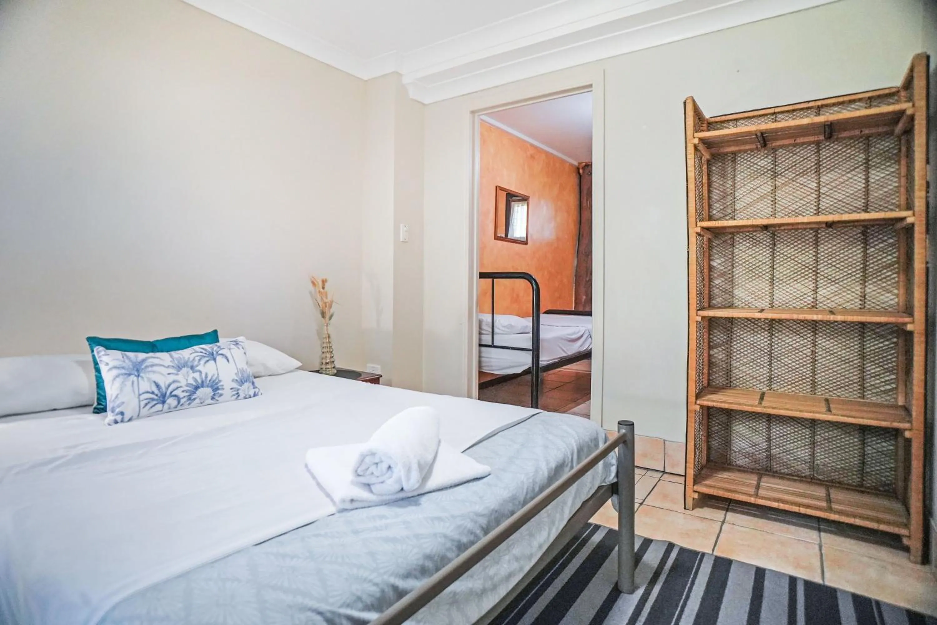 Bed in Woolshed Eco Lodge