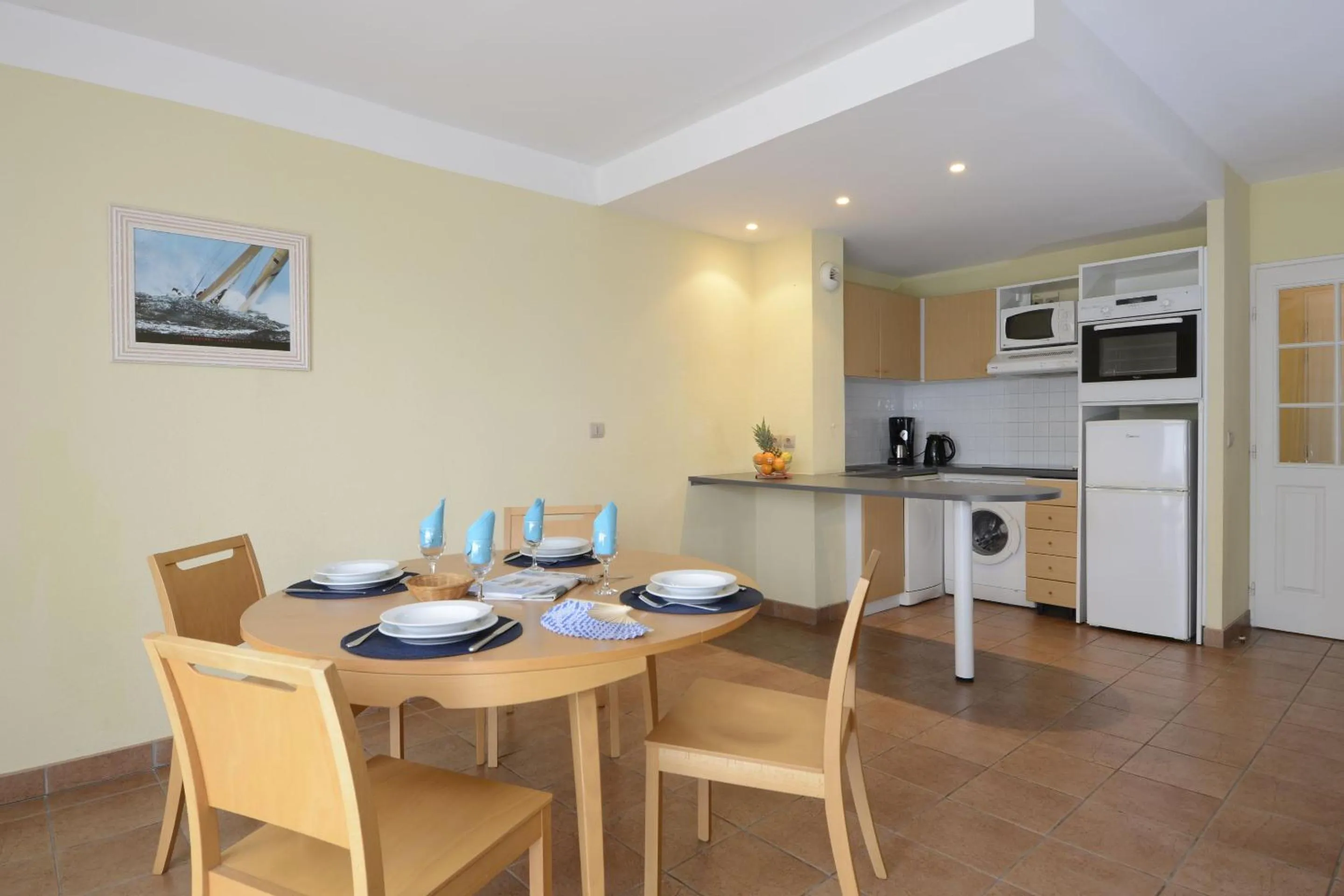 Kitchen or kitchenette in Résidence Odalys Les Greens du Bassin