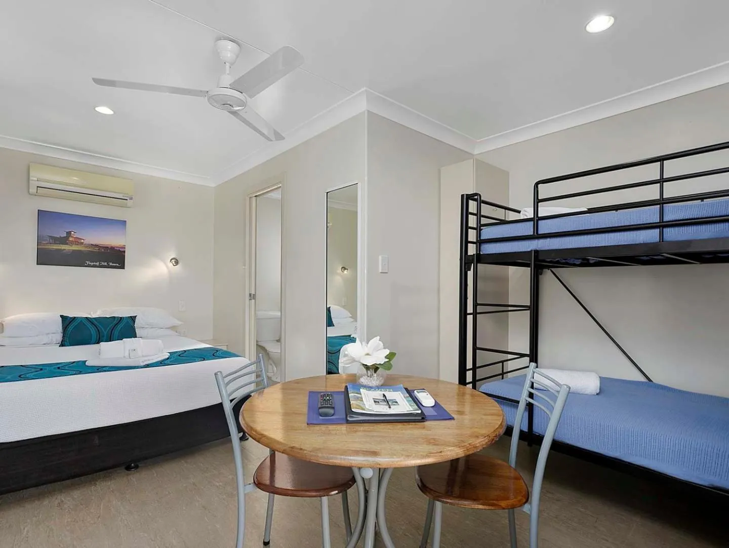 Dining area, Bed in Queens Beach Tourist Village