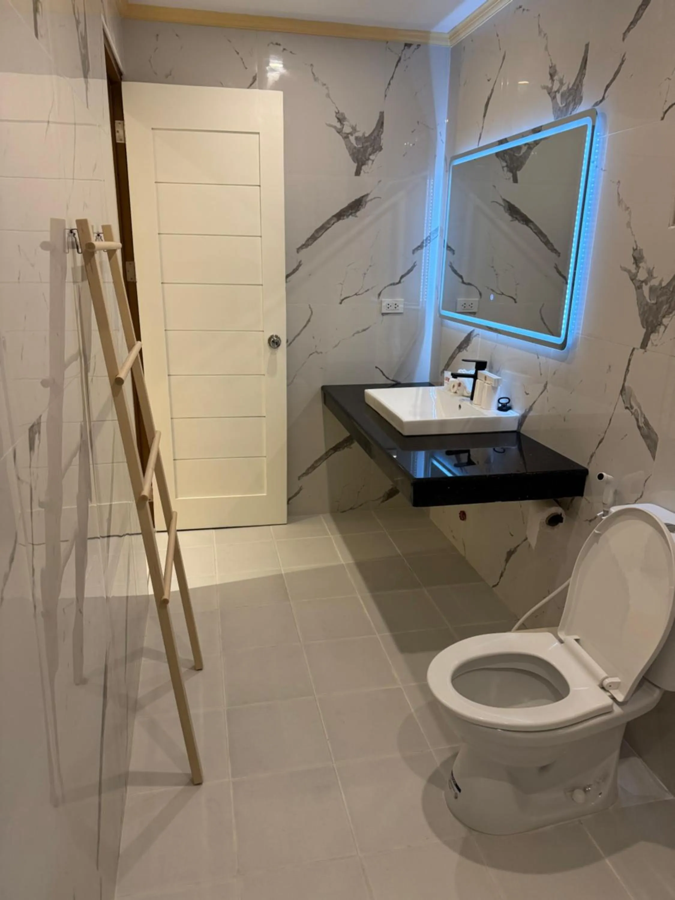 Toilet in Alona Vida Beach Resort