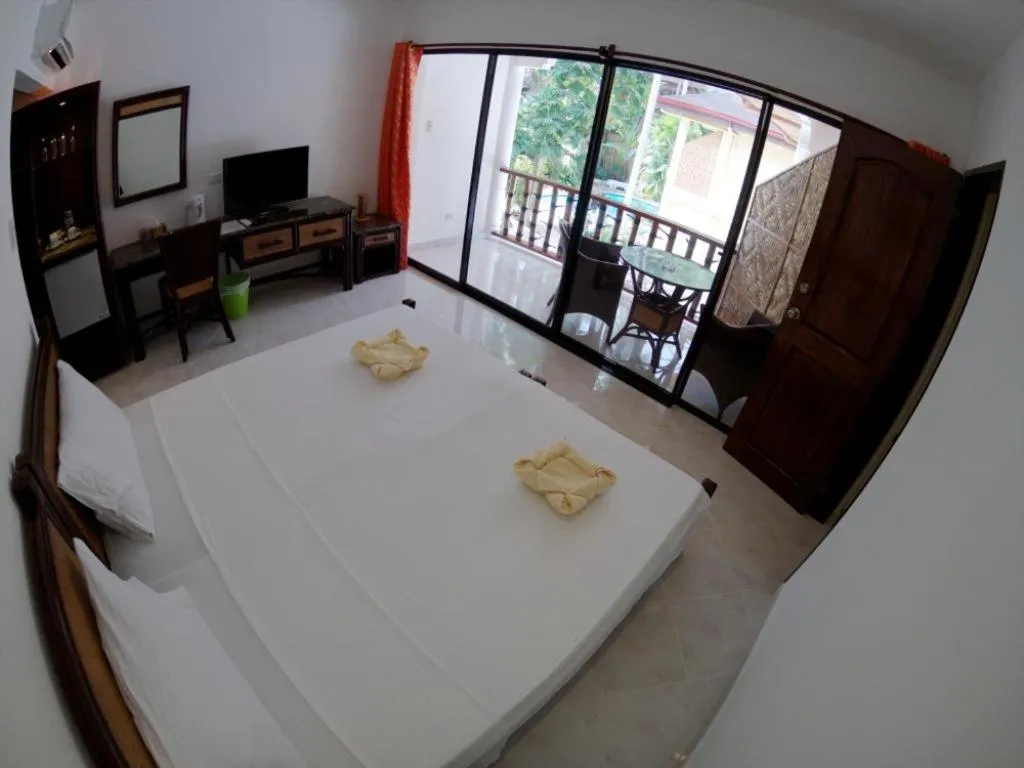 Photo of the whole room, Bed in Alona Vida Beach Resort