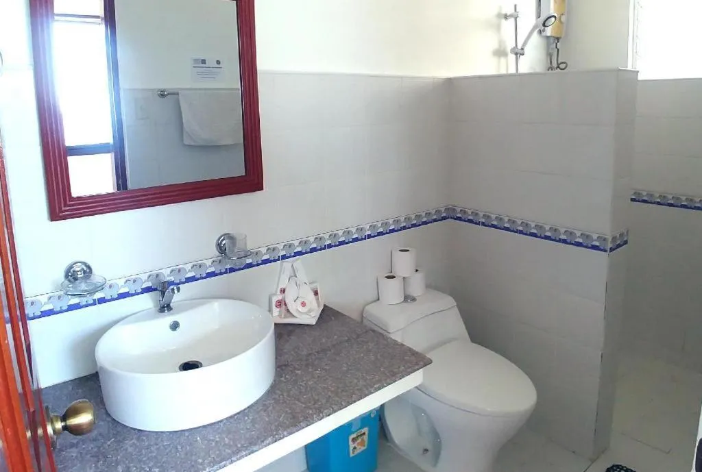 Toilet in Alona Vida Beach Resort