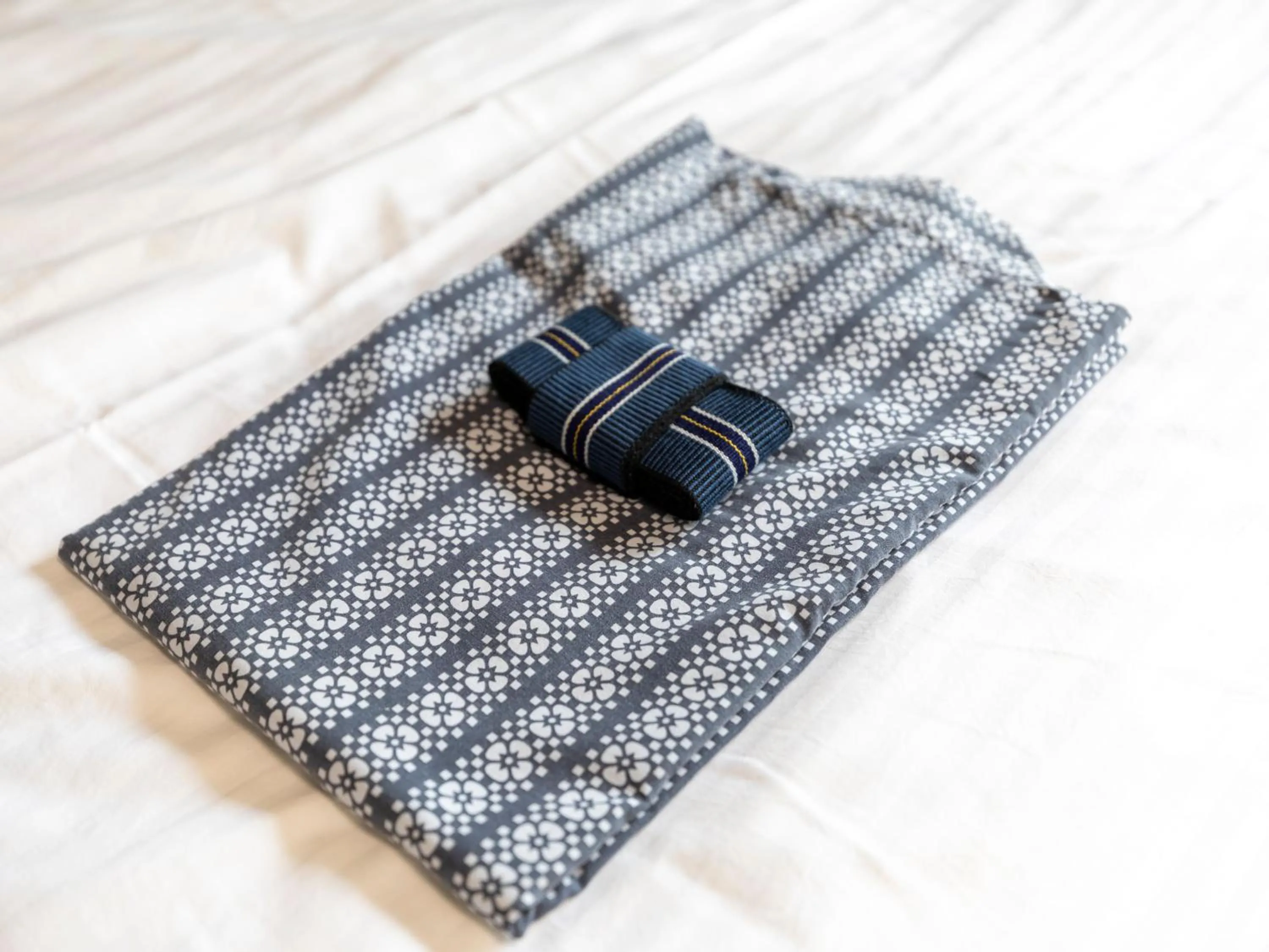 Bed in Tabist Motodai Business Hotel Kanonji