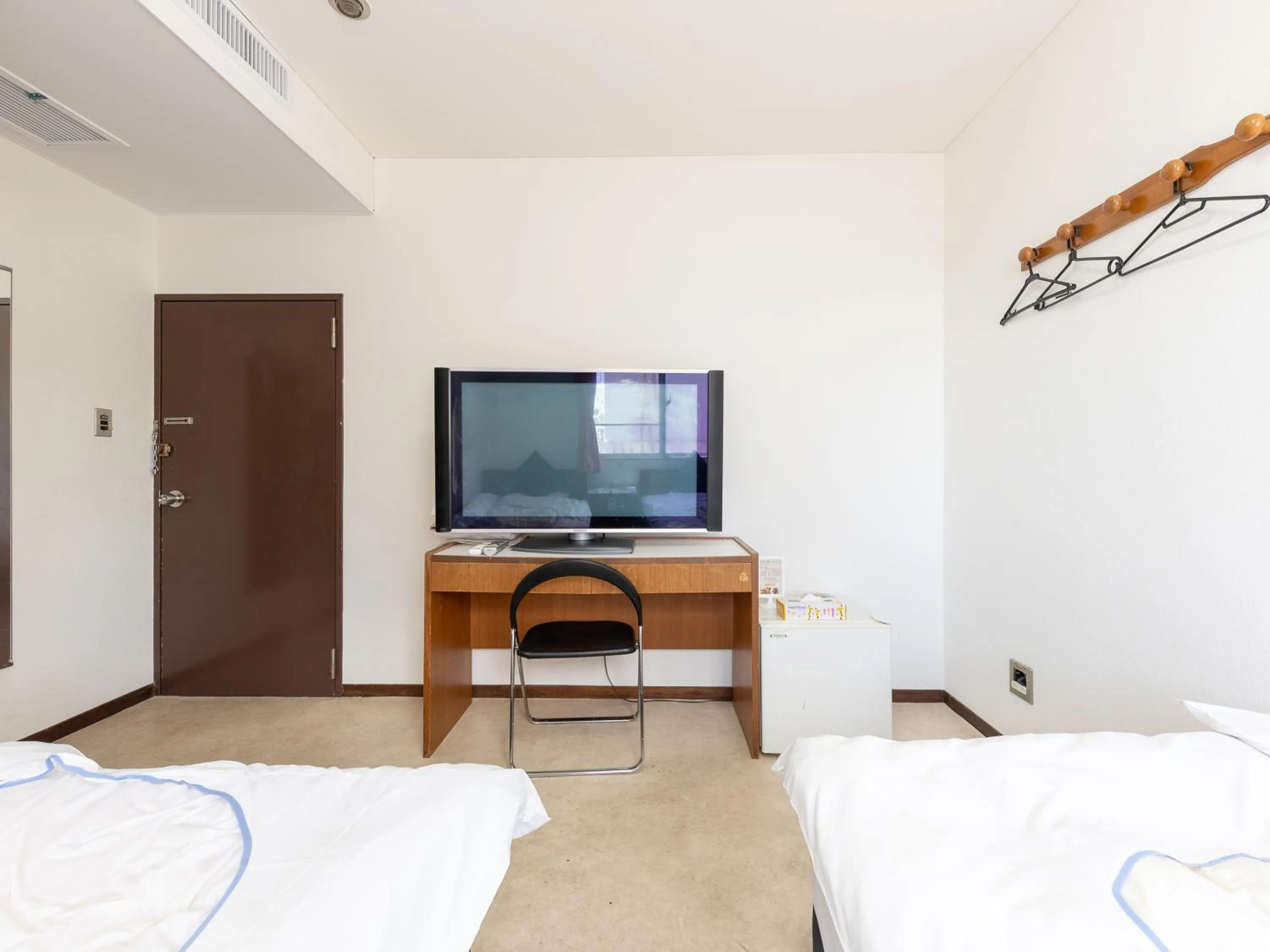 Bed in Tabist Business Hotel Kanazono Gifu