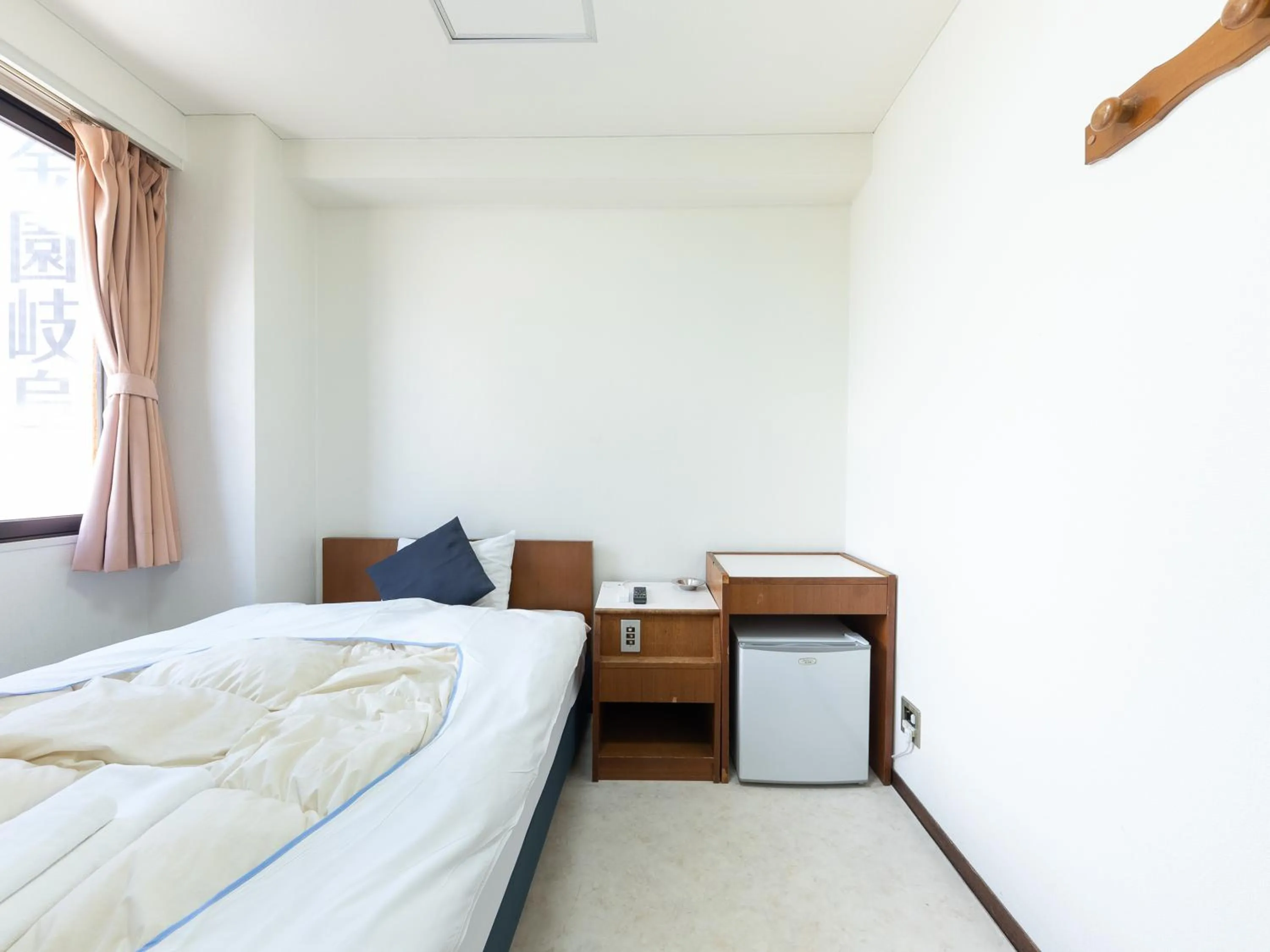 Bed in Tabist Business Hotel Kanazono Gifu