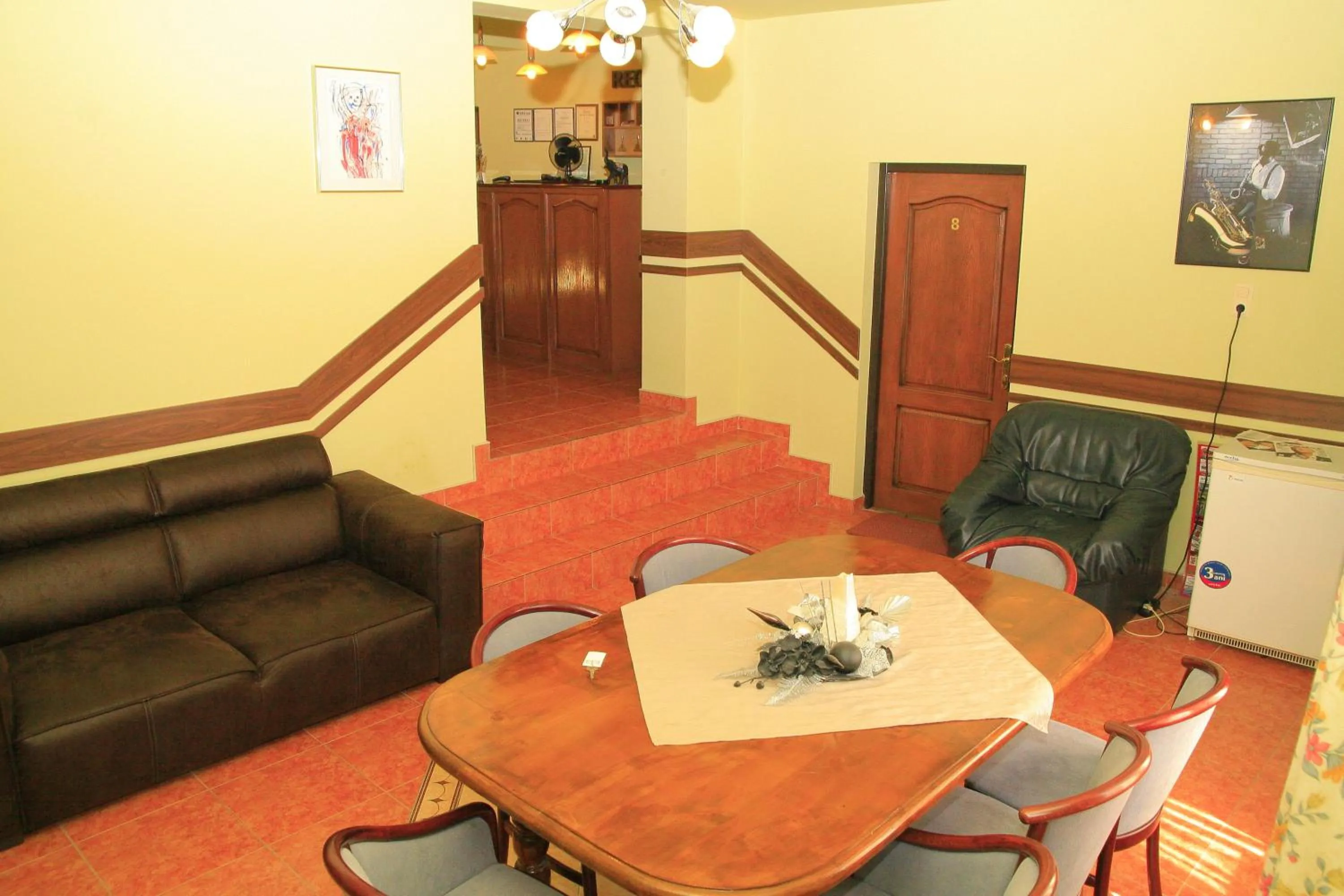 Communal lounge/ TV room in Pensiunea Blanca