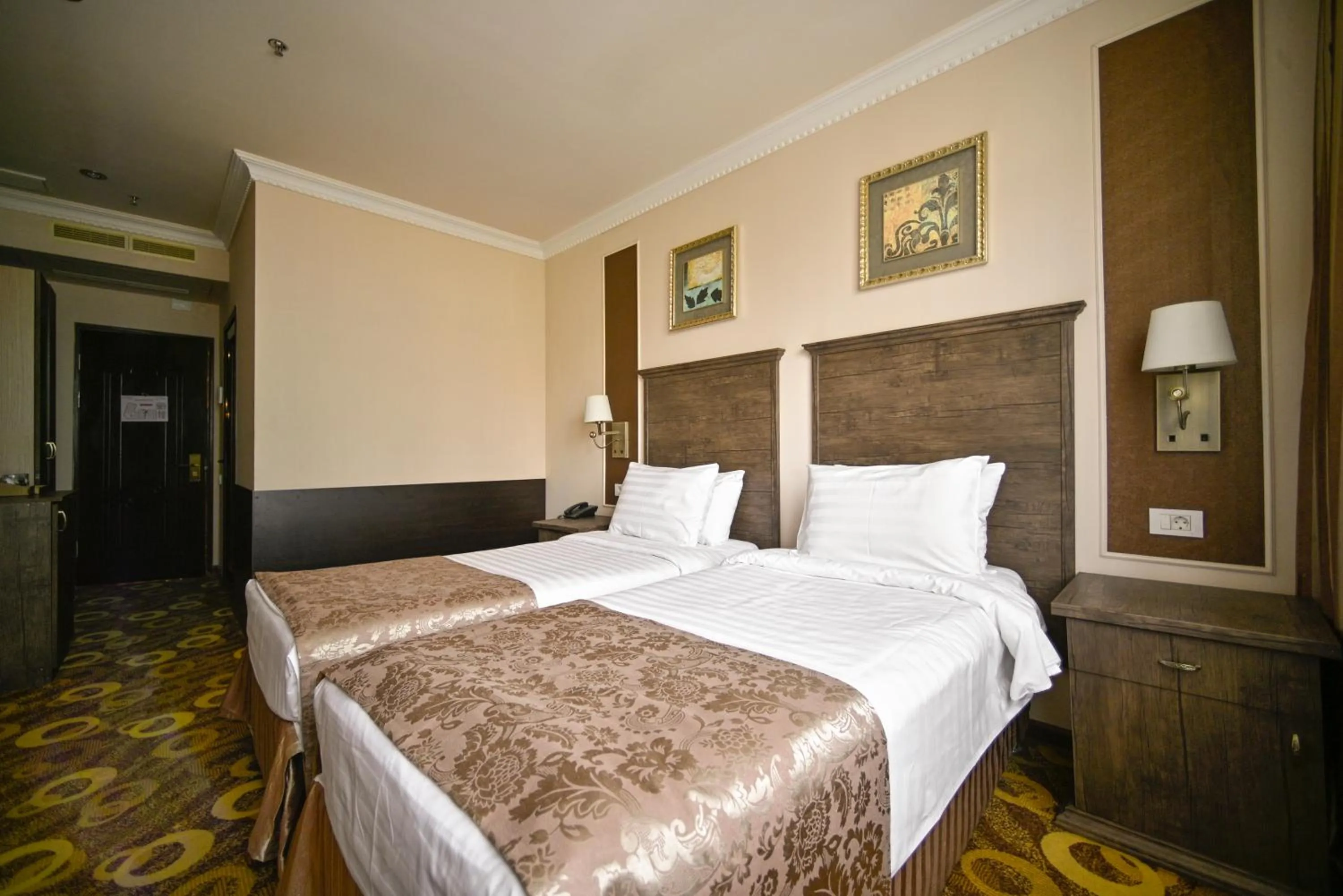Bed in Imperial Palace Hotel Yerevan