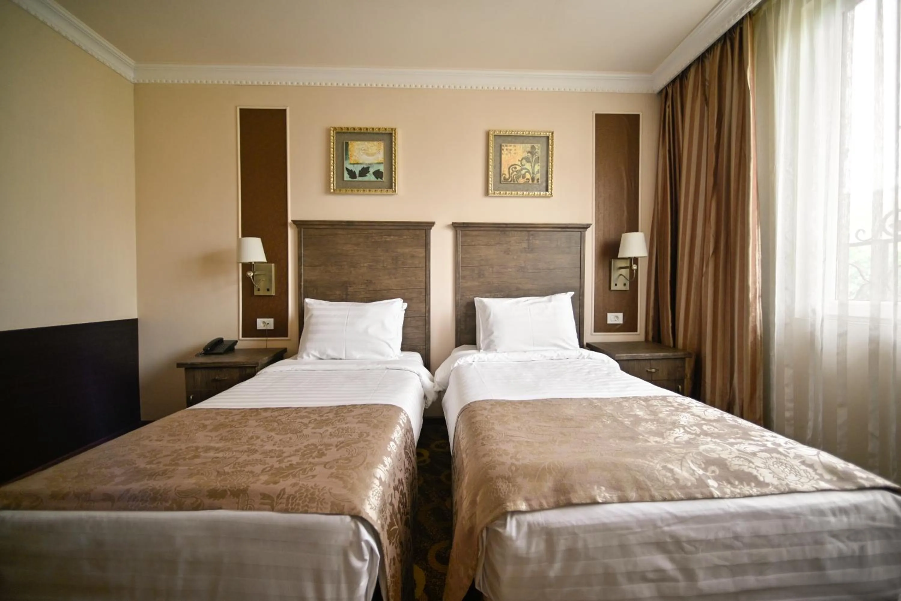 Bed in Imperial Palace Hotel Yerevan