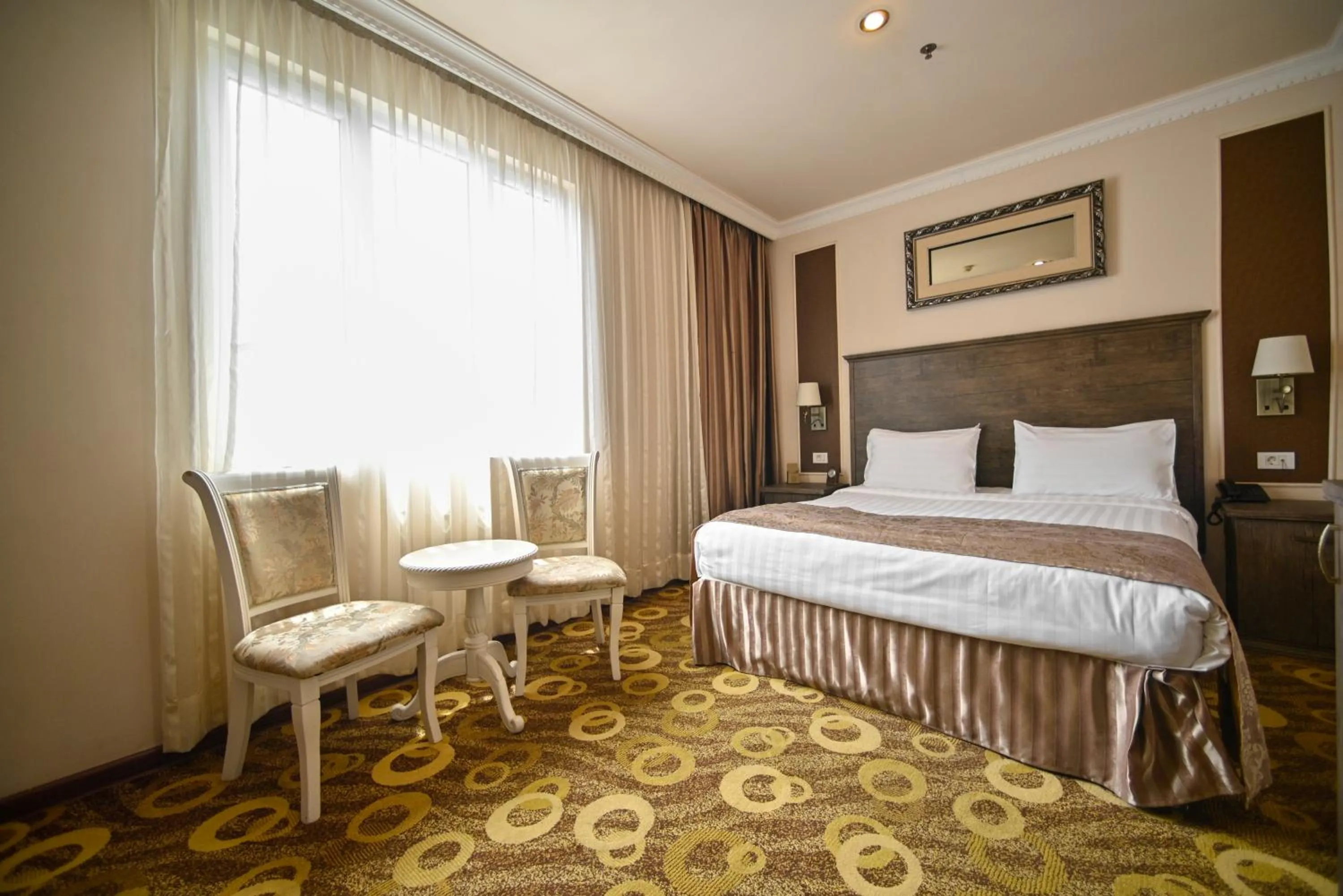 Bed in Imperial Palace Hotel Yerevan