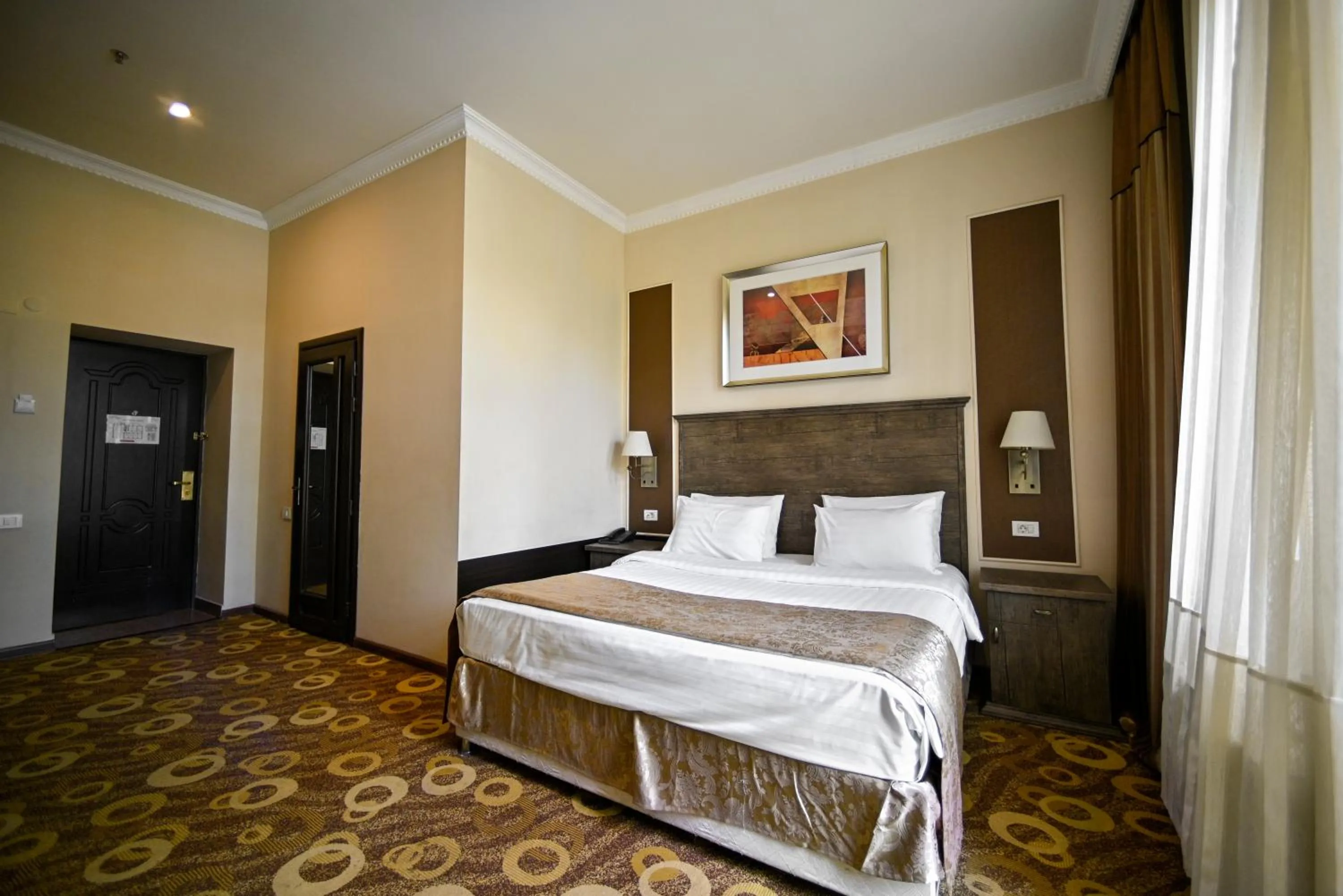 Bed in Imperial Palace Hotel Yerevan