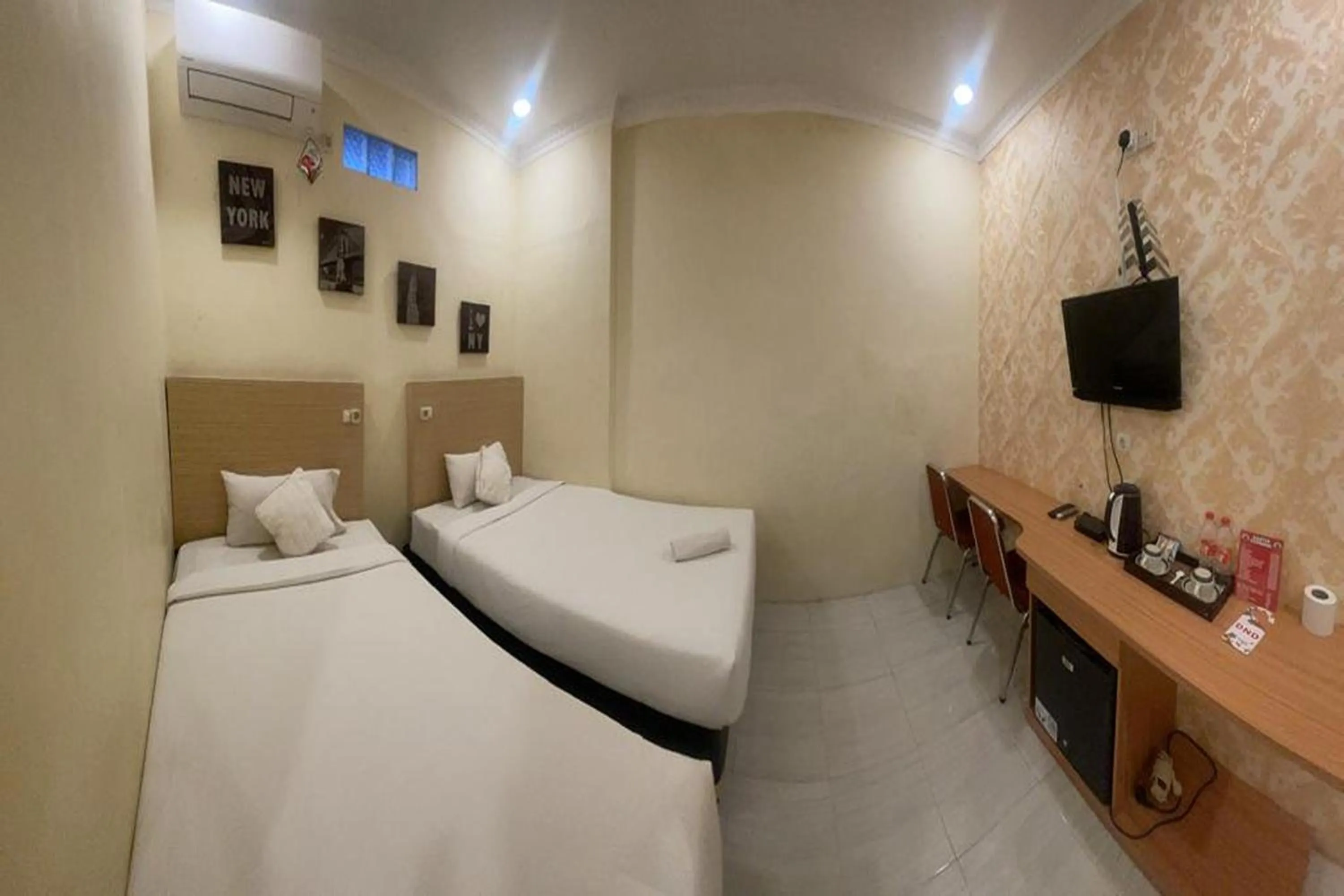 Bed in Perdana Kasih Hotel Klaten