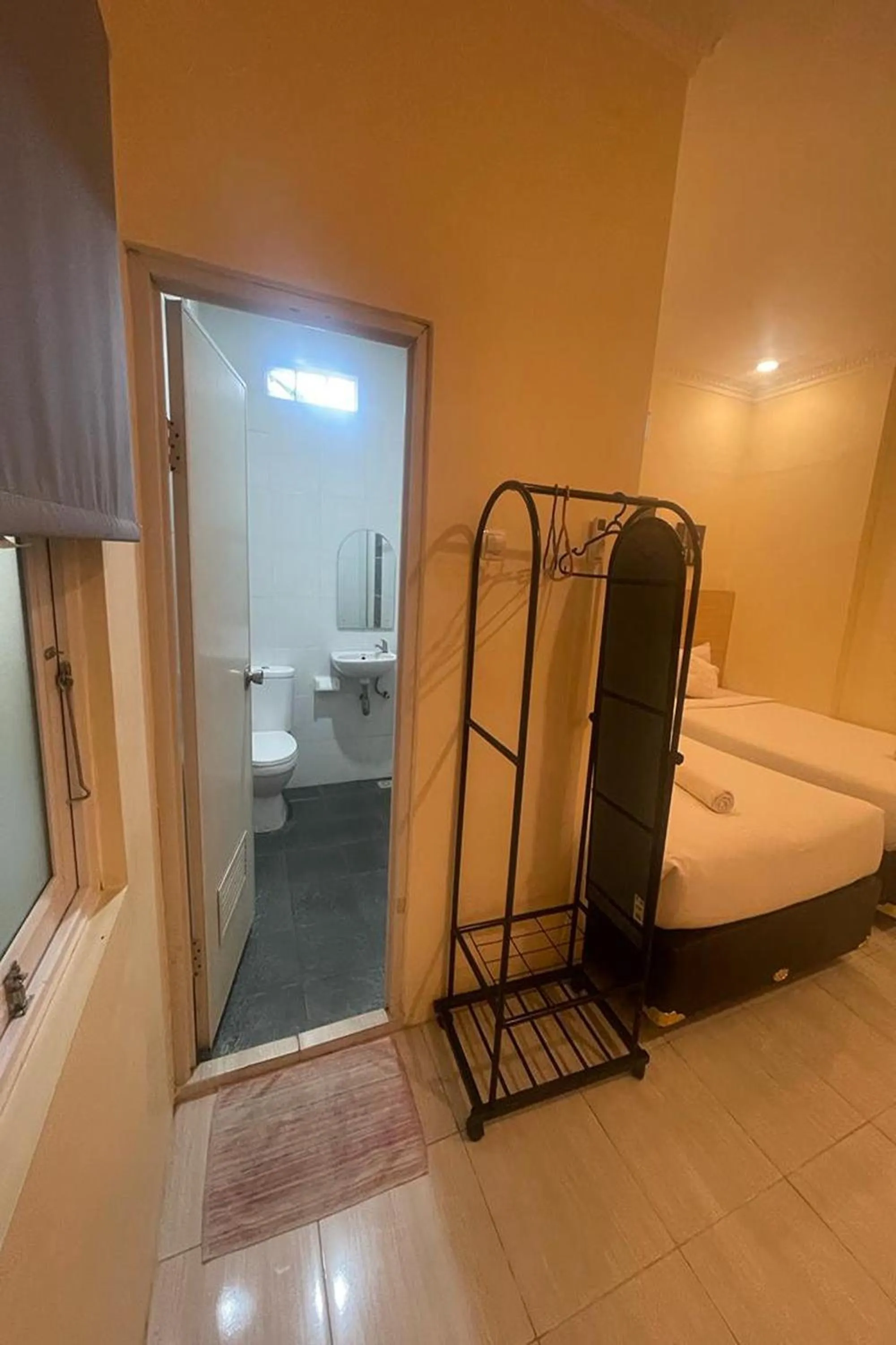 Bed in Perdana Kasih Hotel Klaten