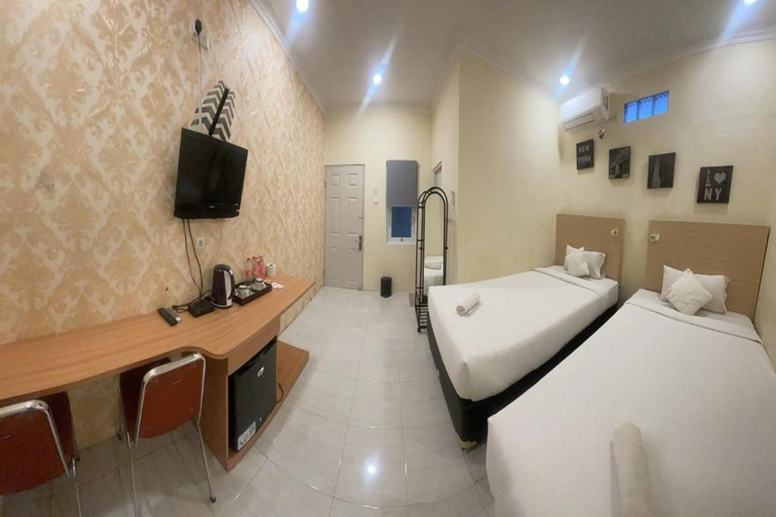 Bed in Perdana Kasih Hotel Klaten