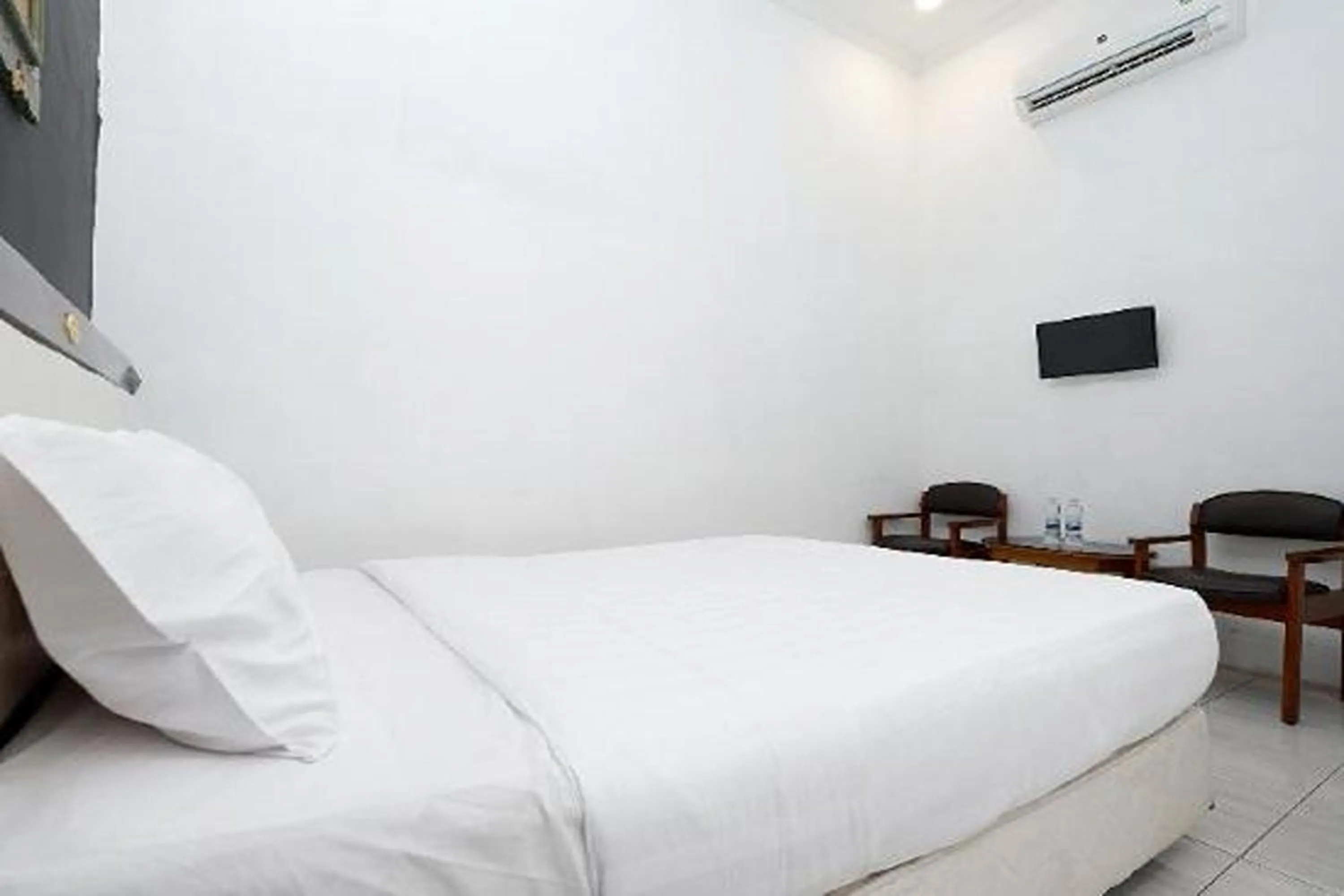 Bed in Perdana Kasih Hotel Klaten