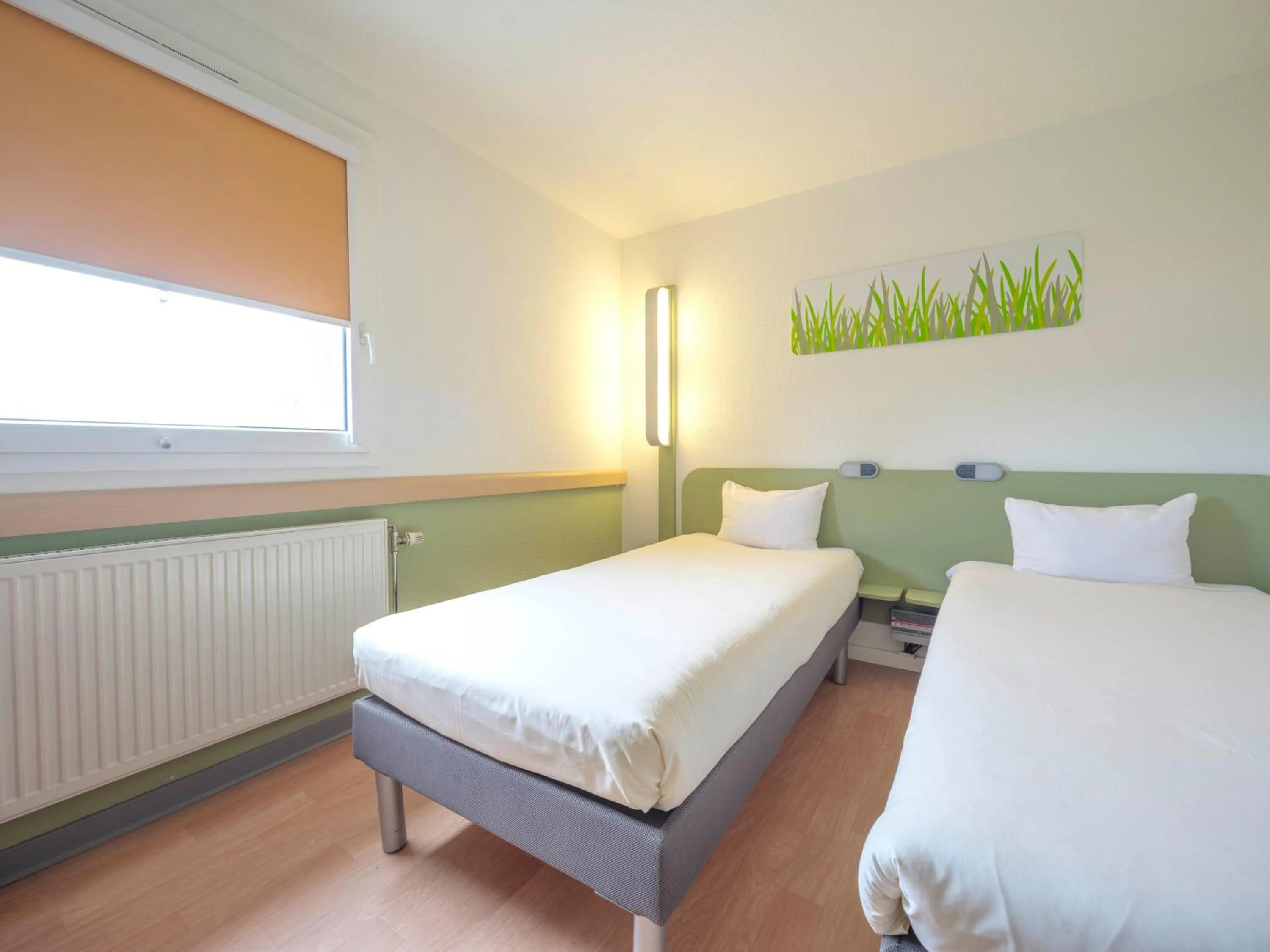 Photo of the whole room, Bed in Ibis Budget Sarrebourg Buhl