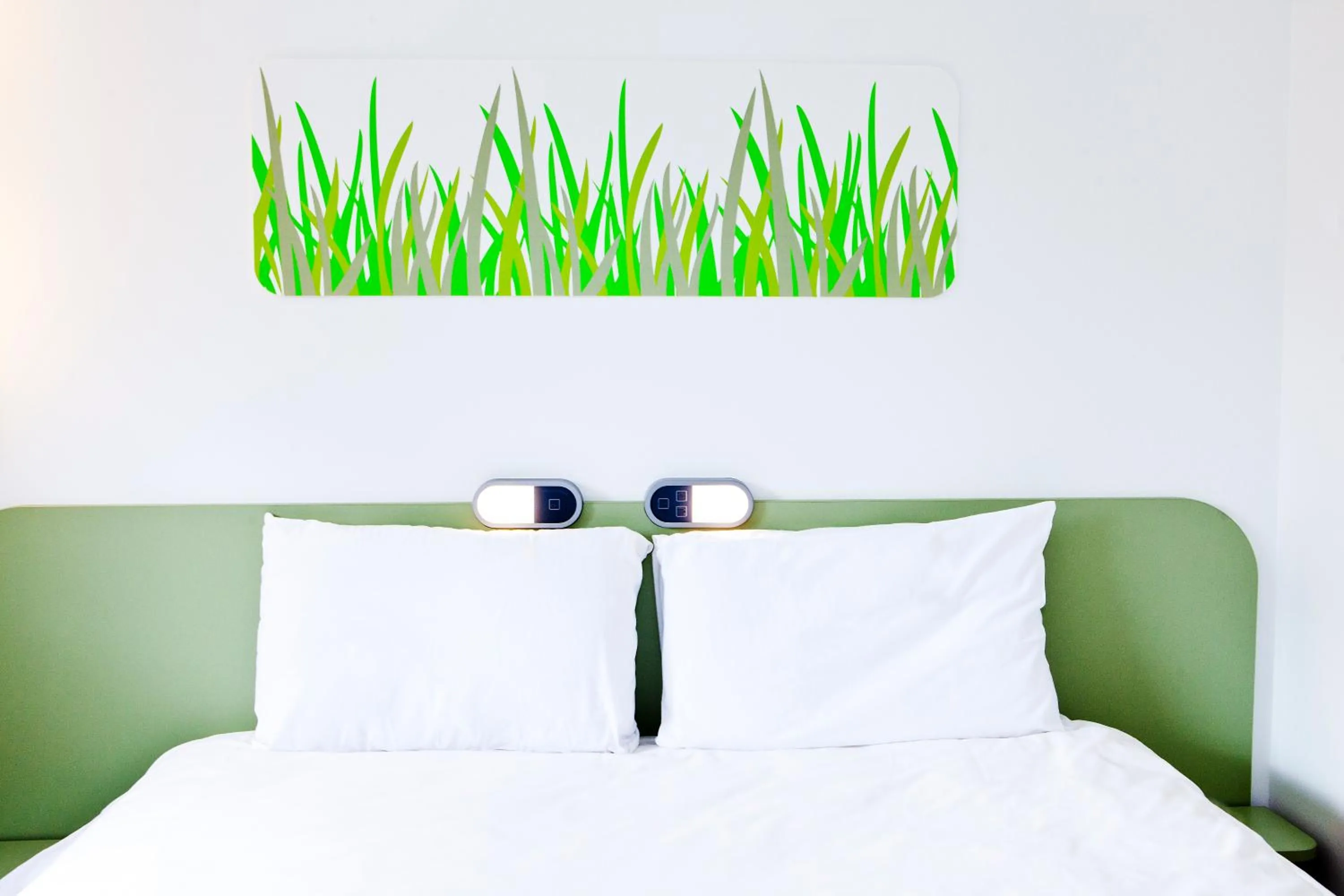 Decorative detail, Bed in Ibis Budget Sarrebourg Buhl