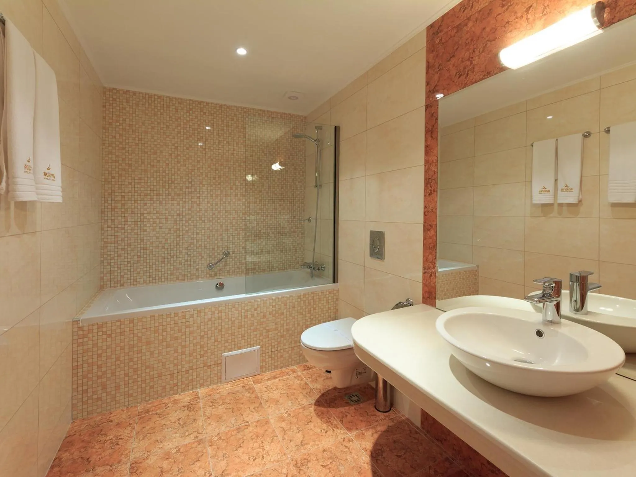 Bathroom in Agusta Hotel, Garden & SPA
