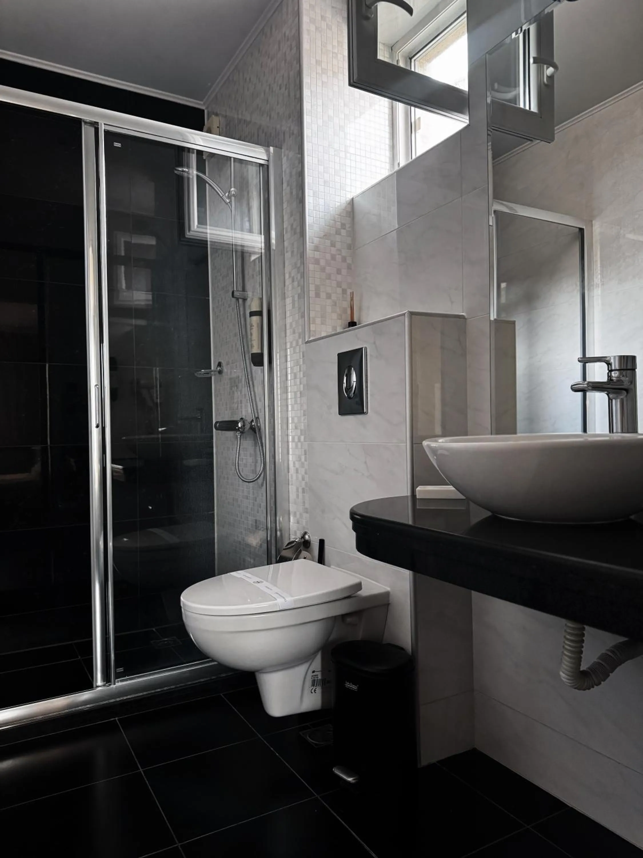 Bathroom in Agusta Hotel, Garden & SPA