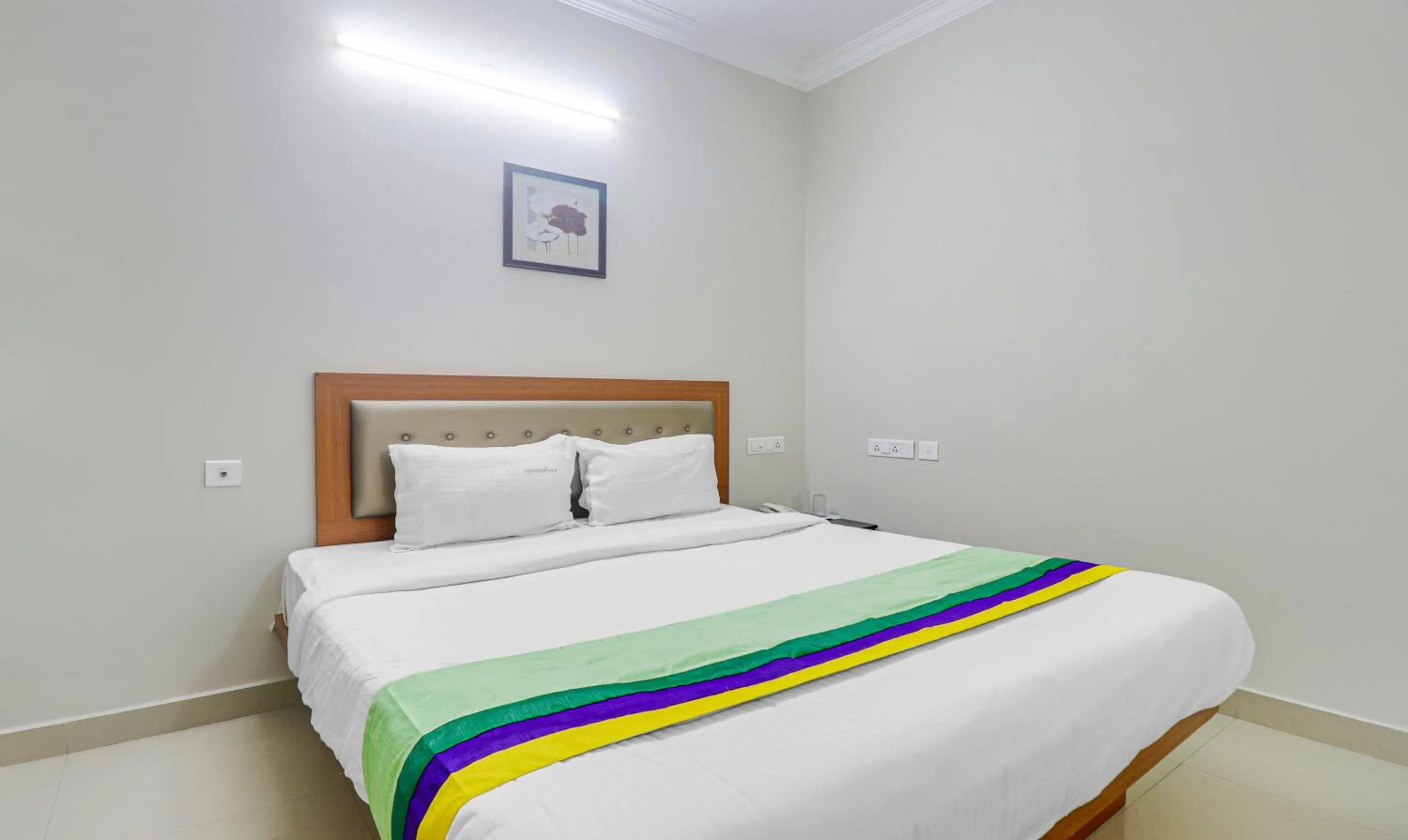 Bedroom, Bed in Treebo Rithikha Inn Elite Chennai Trade Centre