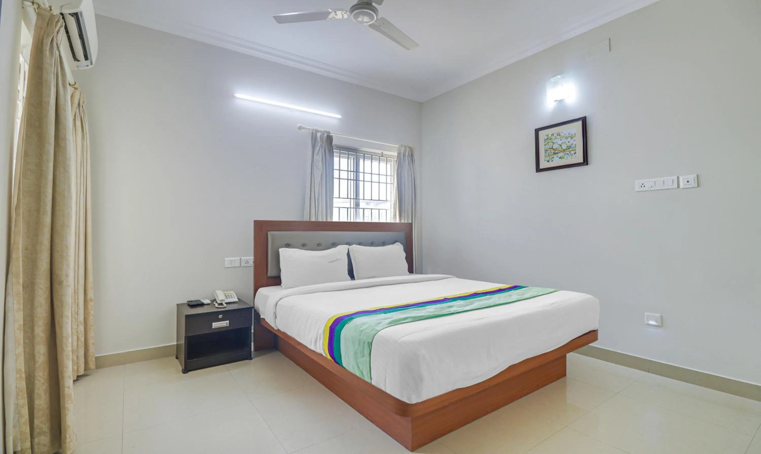 Bedroom, Bed in Treebo Rithikha Inn Elite Chennai Trade Centre
