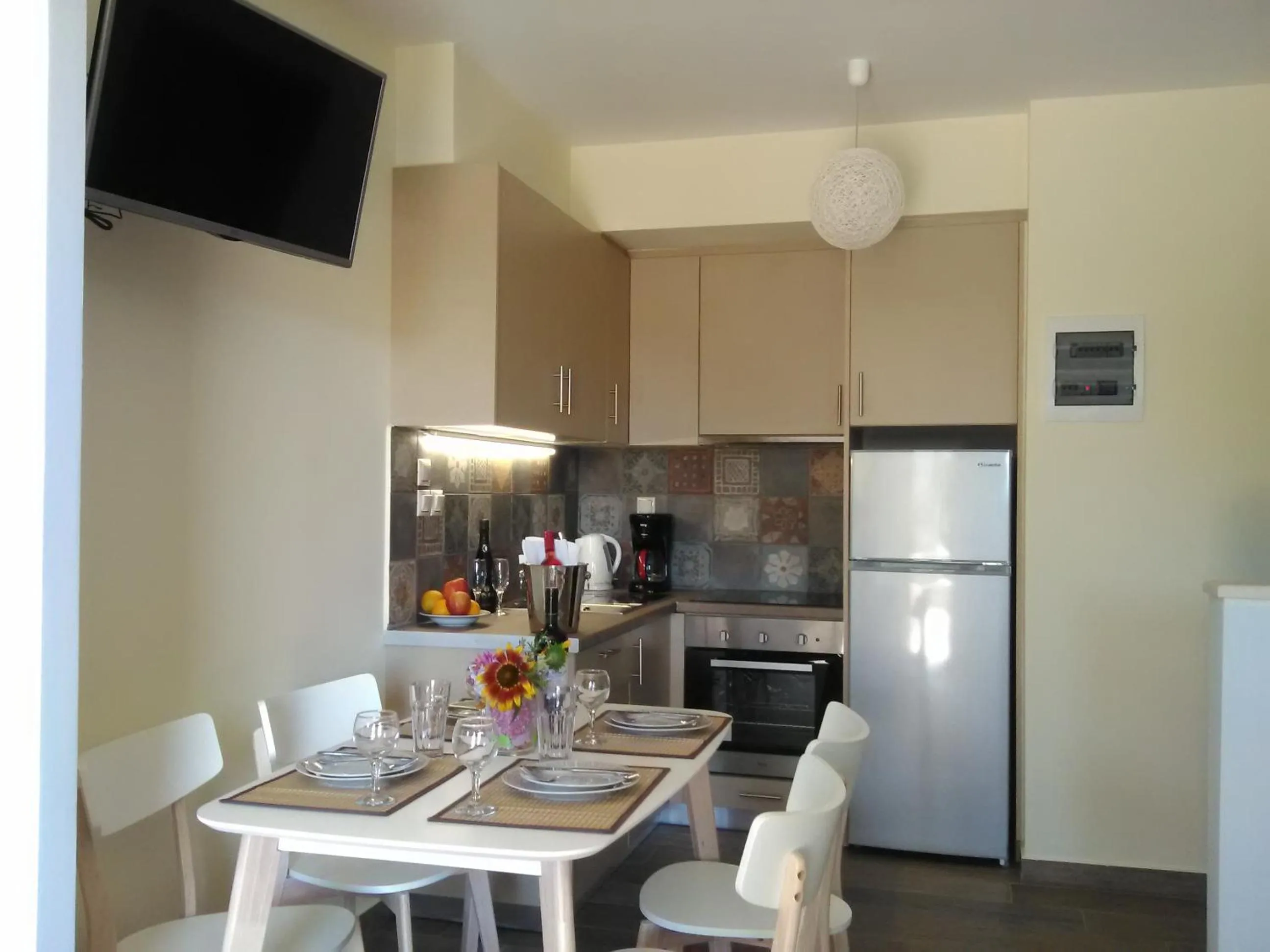 Kitchen or kitchenette in Mikros Gialos Apartments