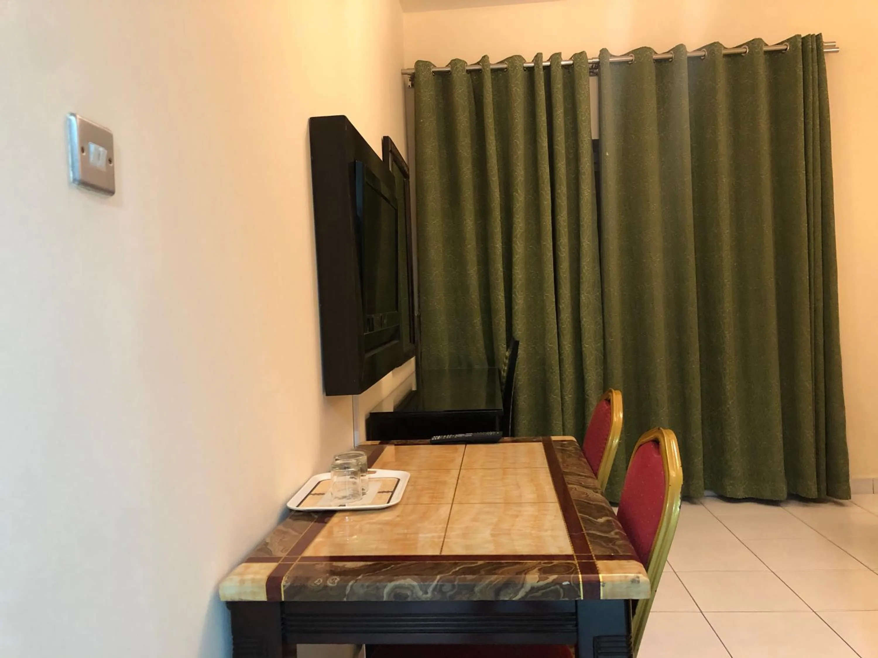 TV and multimedia in New Royal Mark Hotel Apartments