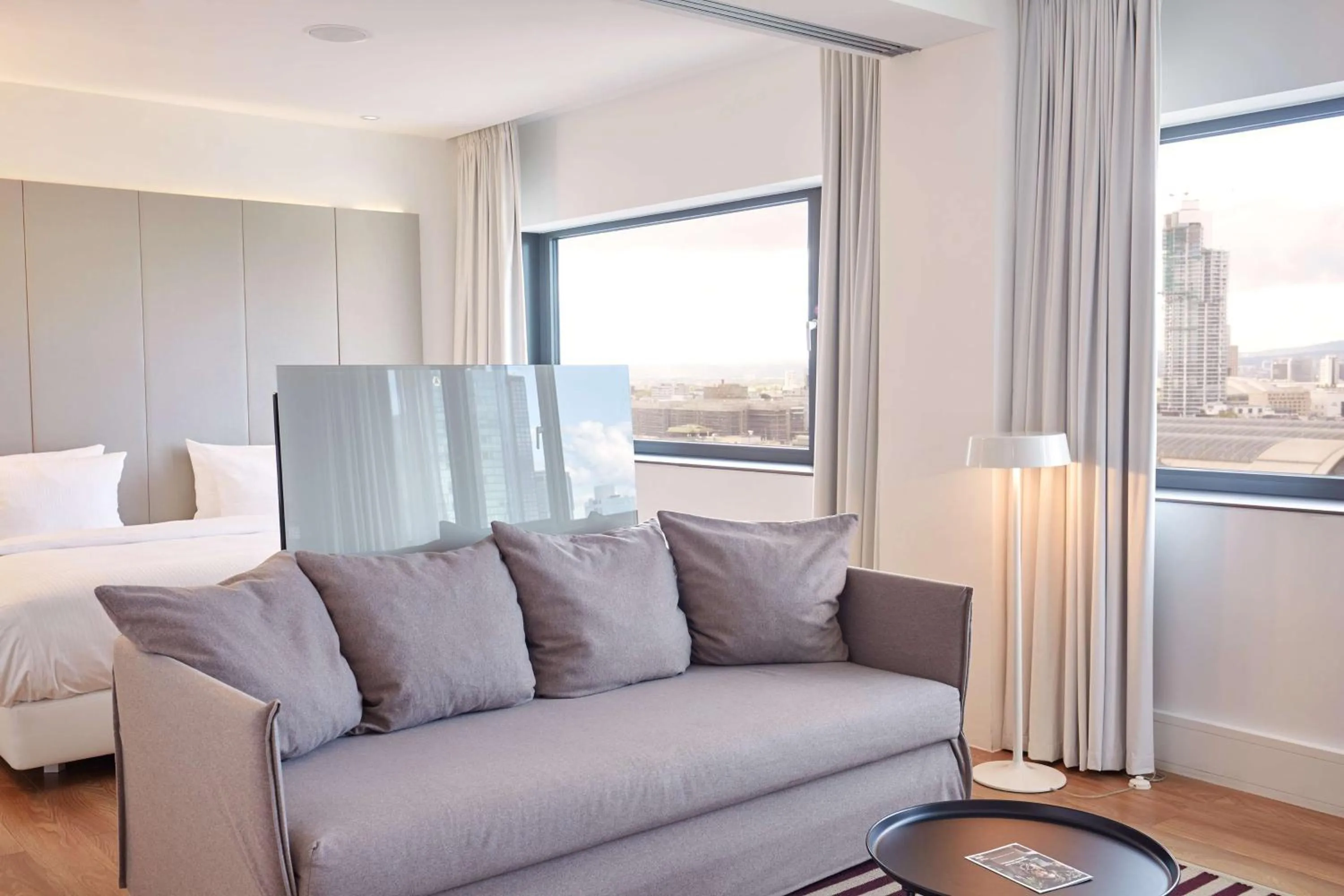 Living room, Bed in Scandic Frankfurt Museumsufer