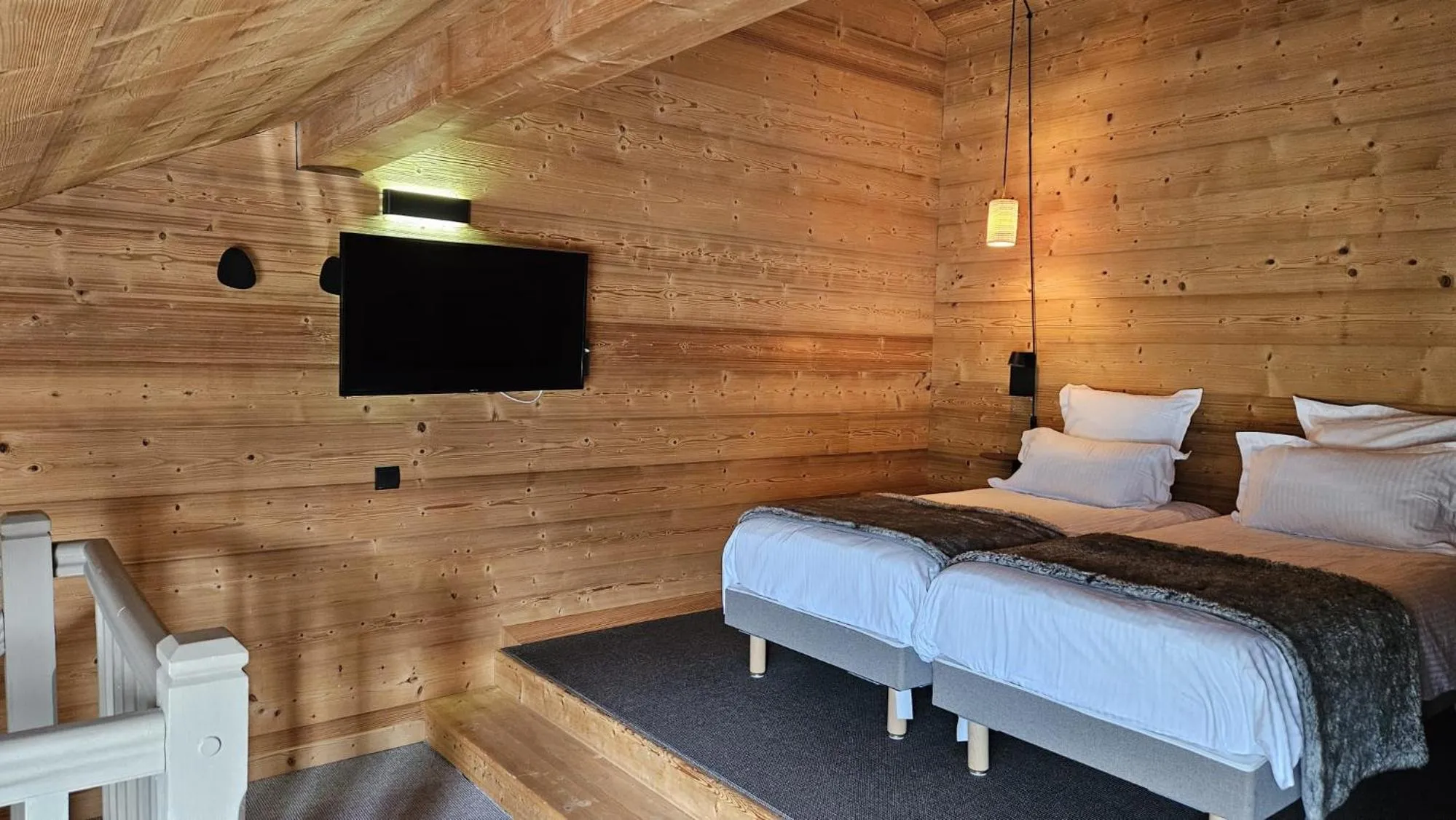 Bed in Le Chalet Blanc Hôtel & Spa