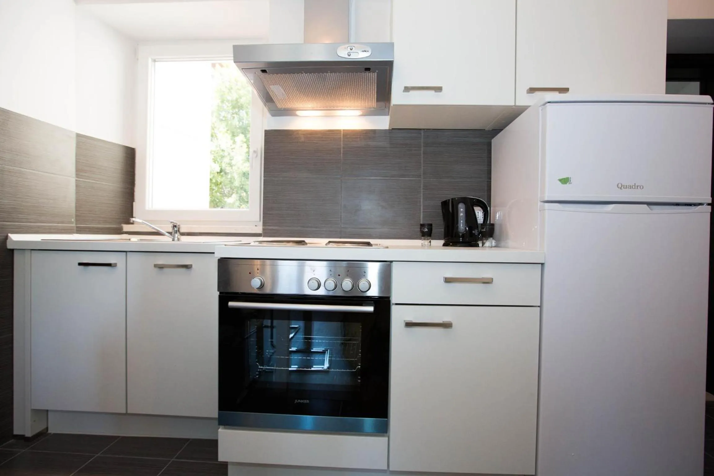 Kitchen or kitchenette in Villa Mia