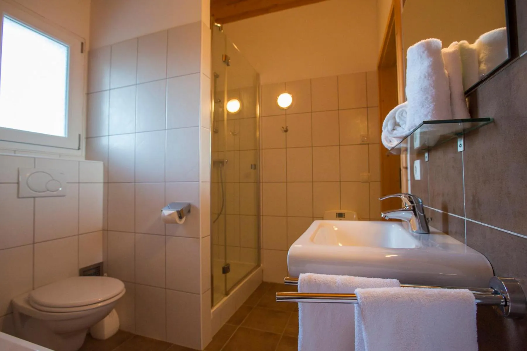 Shower in Alpendorf Dachstein West by ALPS RESORTS