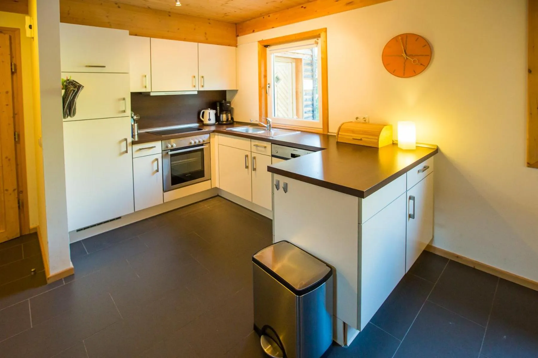 Kitchen or kitchenette in Alpendorf Dachstein West by ALPS RESORTS