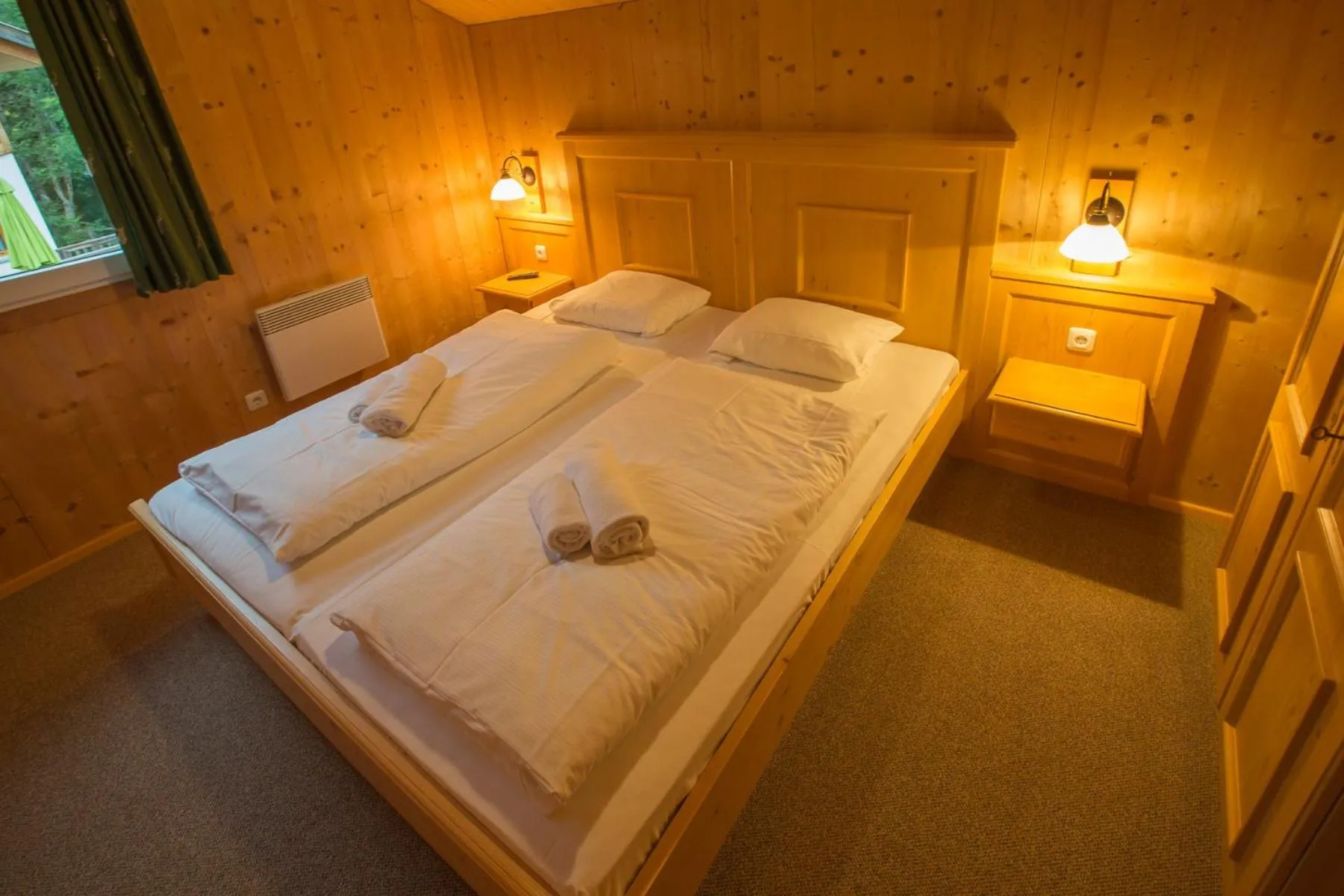 Bedroom, Bed in Alpendorf Dachstein West by ALPS RESORTS