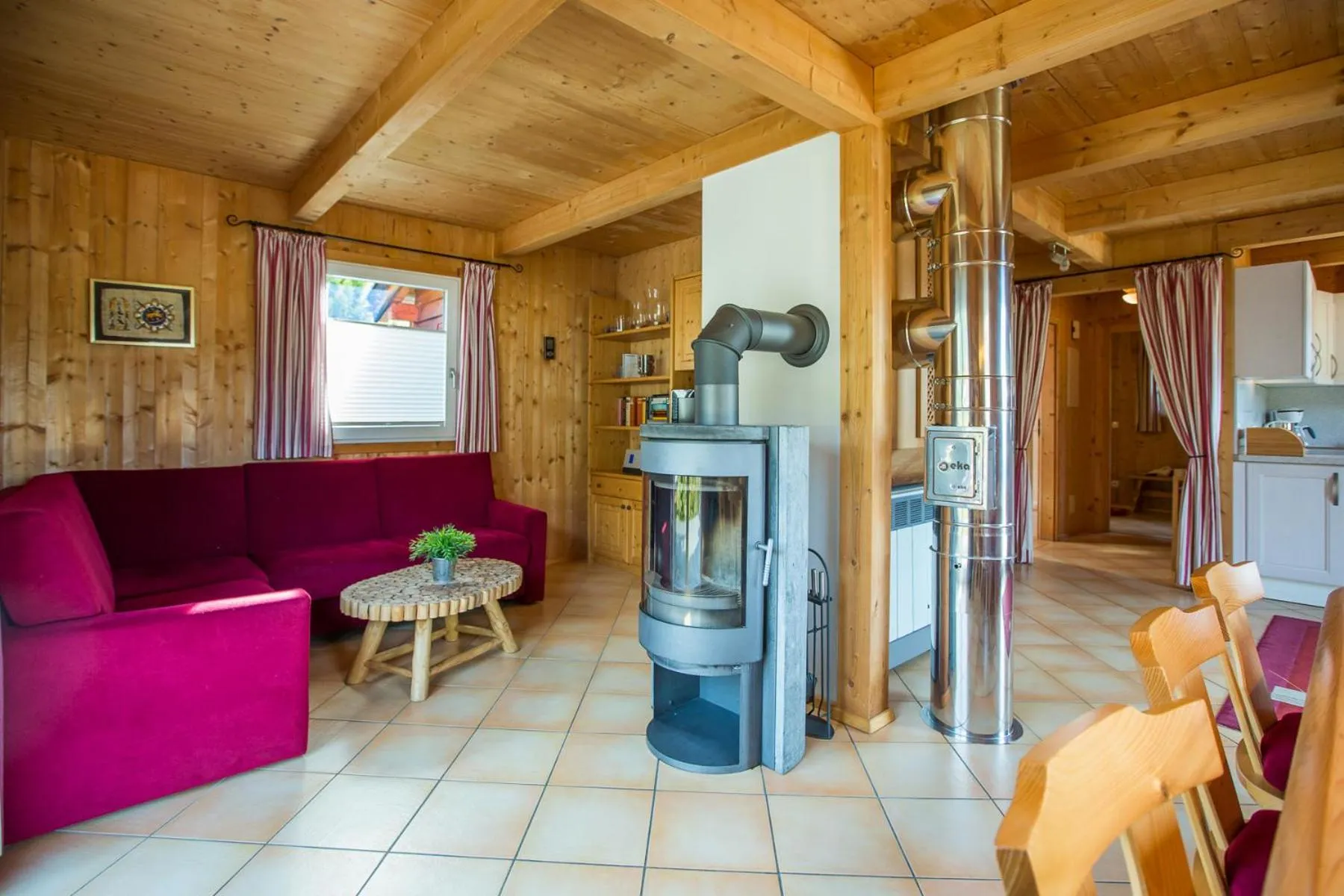 Living room in Alpendorf Dachstein West by ALPS RESORTS