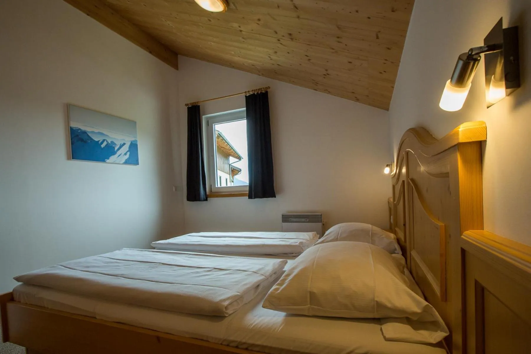 Bedroom, Bed in Alpendorf Dachstein West by ALPS RESORTS
