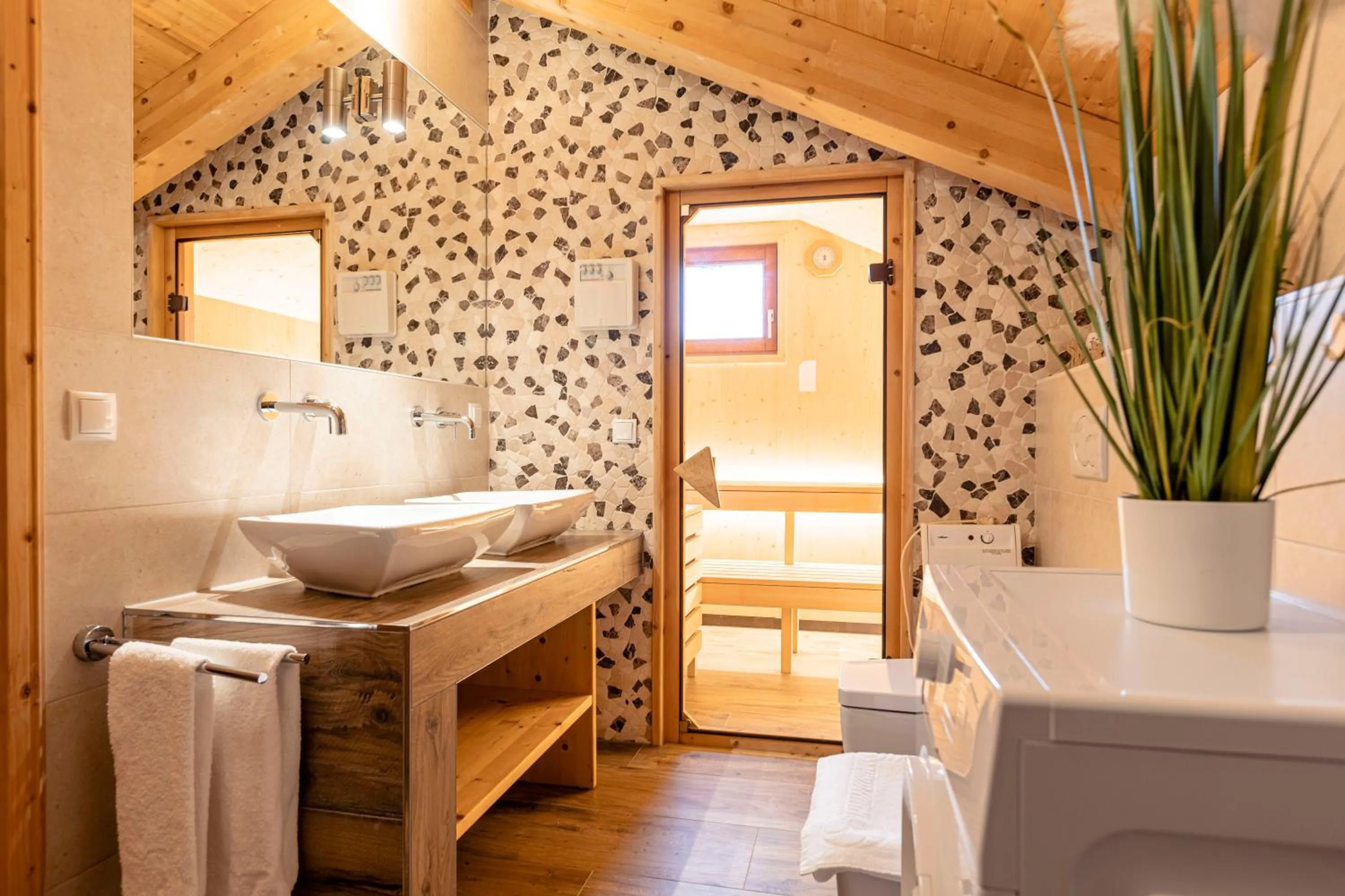 Bathroom in Alpendorf Dachstein West by ALPS RESORTS