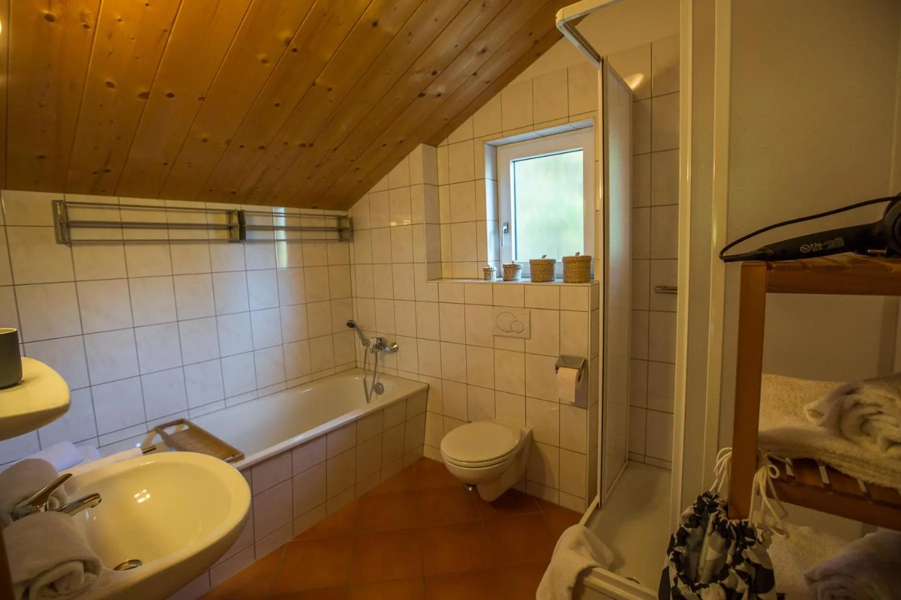 Bathroom in Alpendorf Dachstein West by ALPS RESORTS