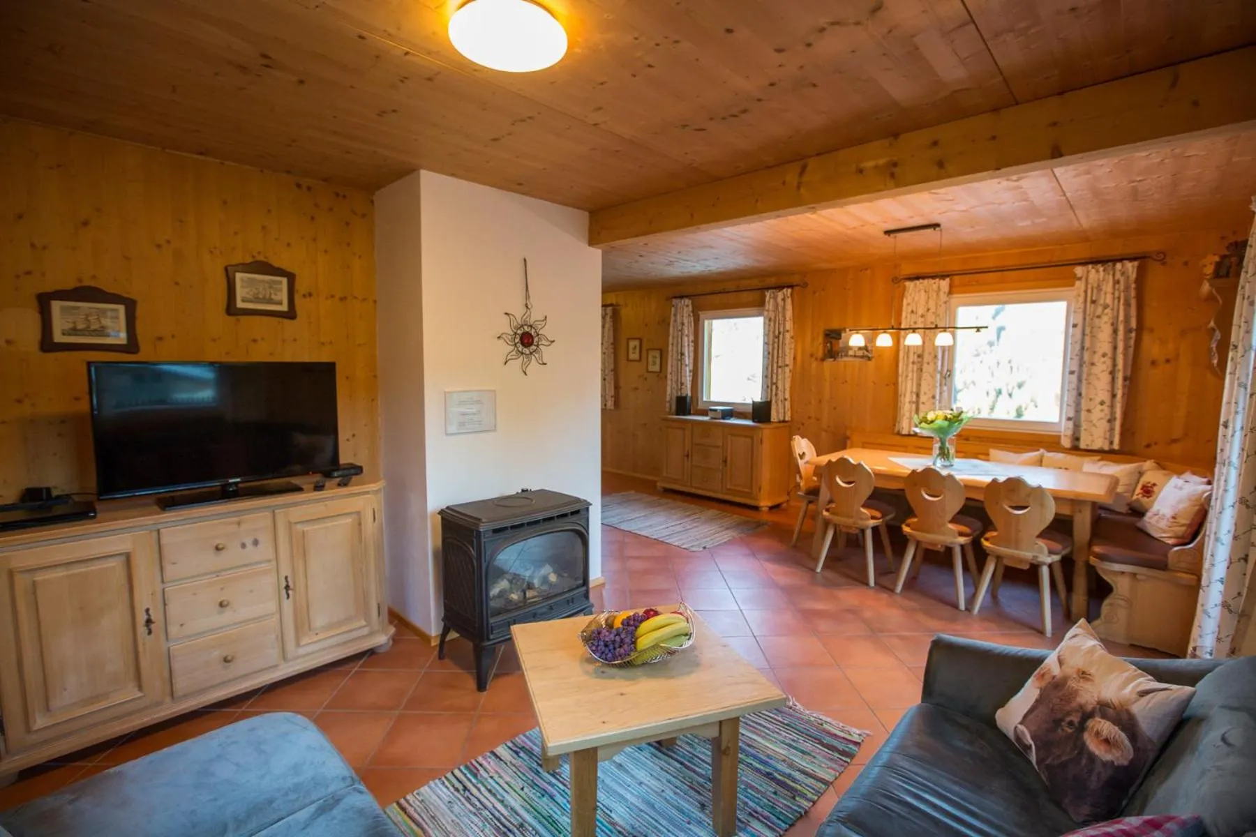 Living room in Alpendorf Dachstein West by ALPS RESORTS