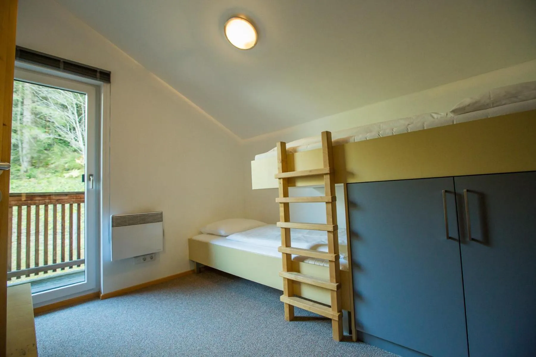 Bedroom, Bed in Alpendorf Dachstein West by ALPS RESORTS