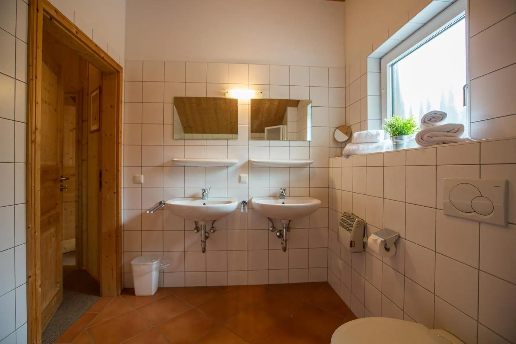 Bathroom in Alpendorf Dachstein West by ALPS RESORTS