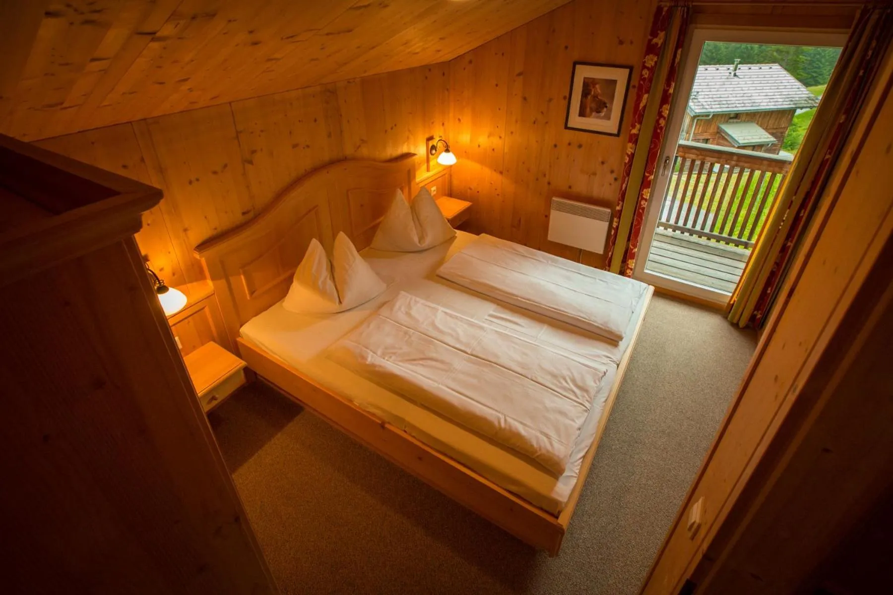 Bedroom, Bed in Alpendorf Dachstein West by ALPS RESORTS