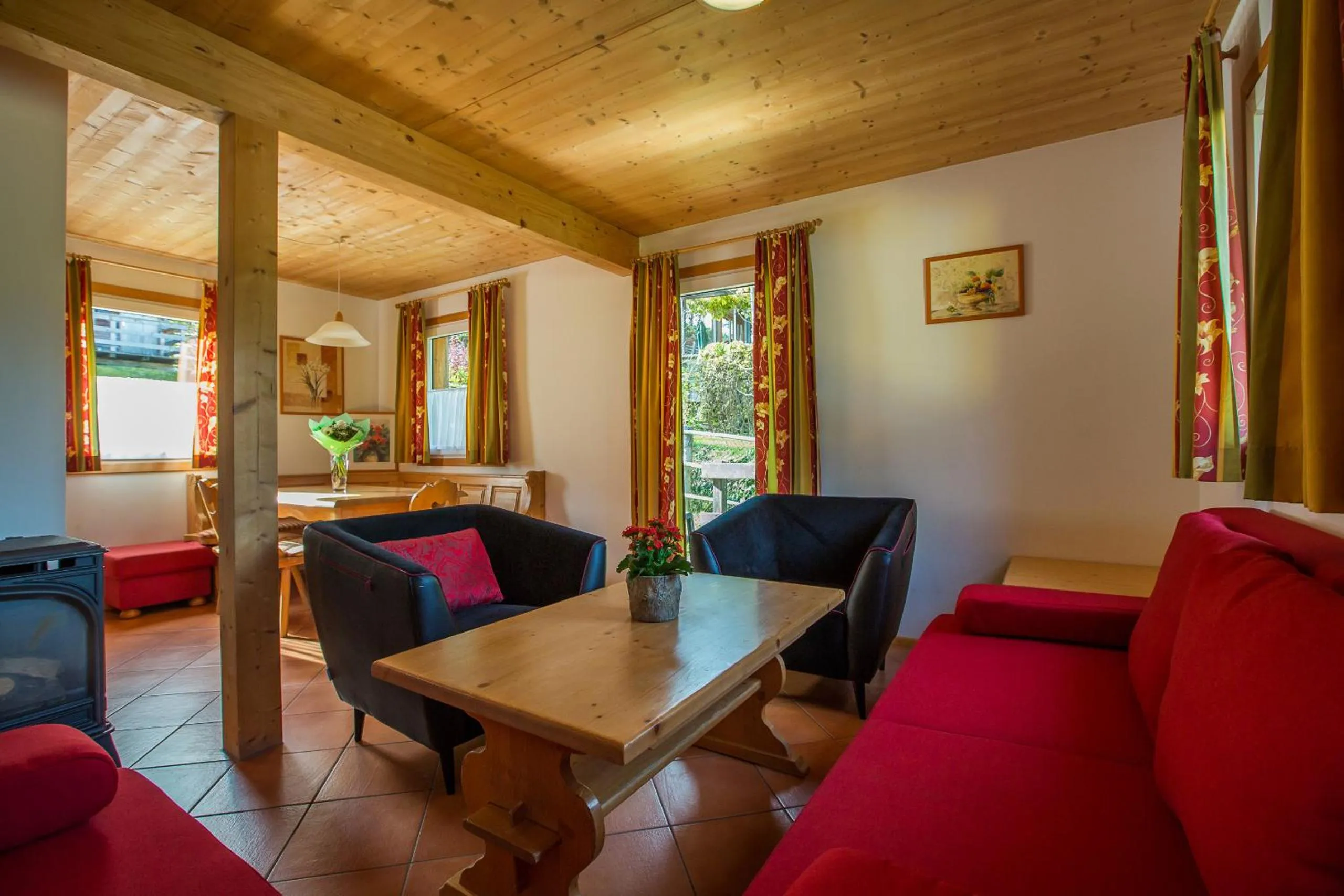 Living room in Alpendorf Dachstein West by ALPS RESORTS