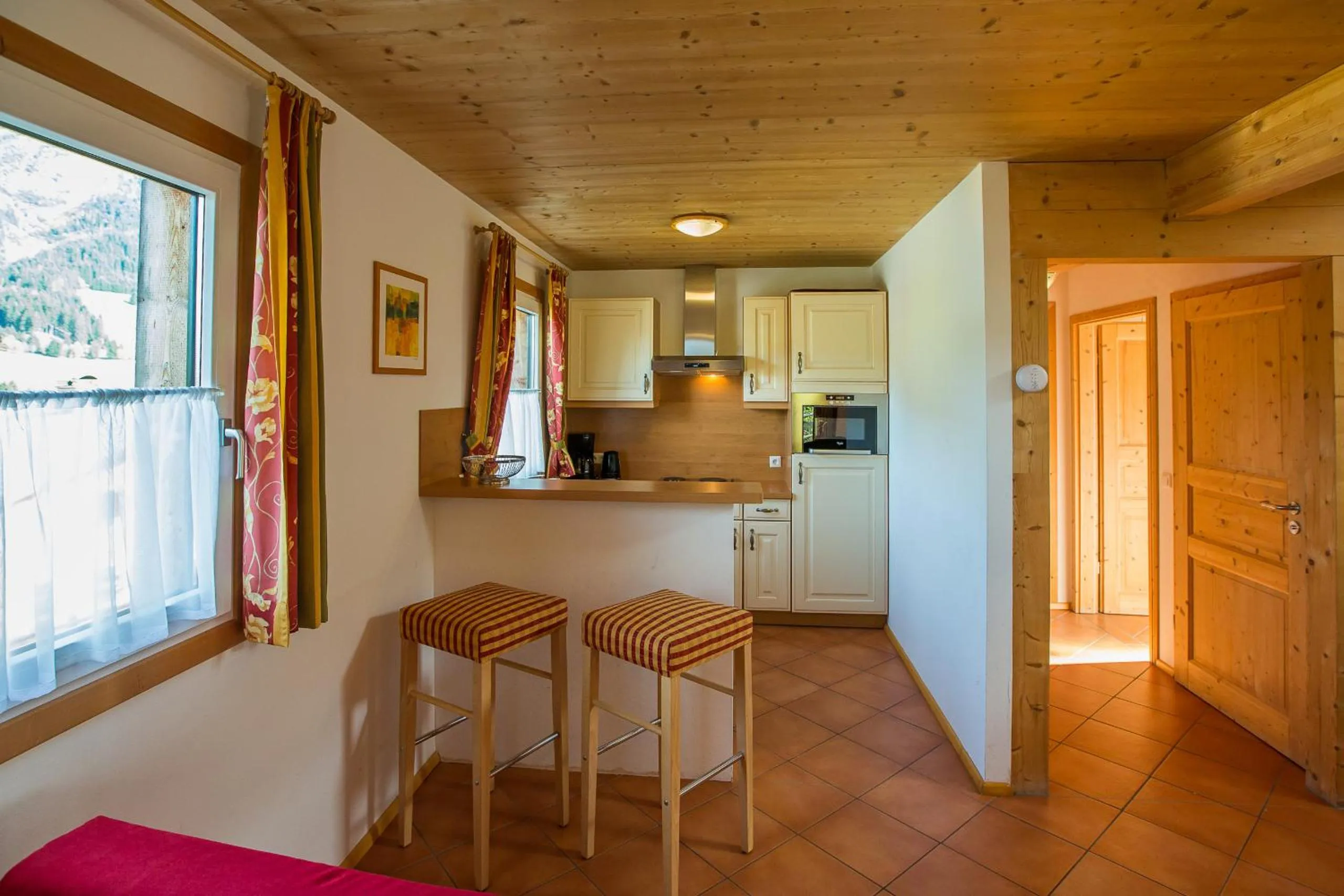 Kitchen or kitchenette in Alpendorf Dachstein West by ALPS RESORTS
