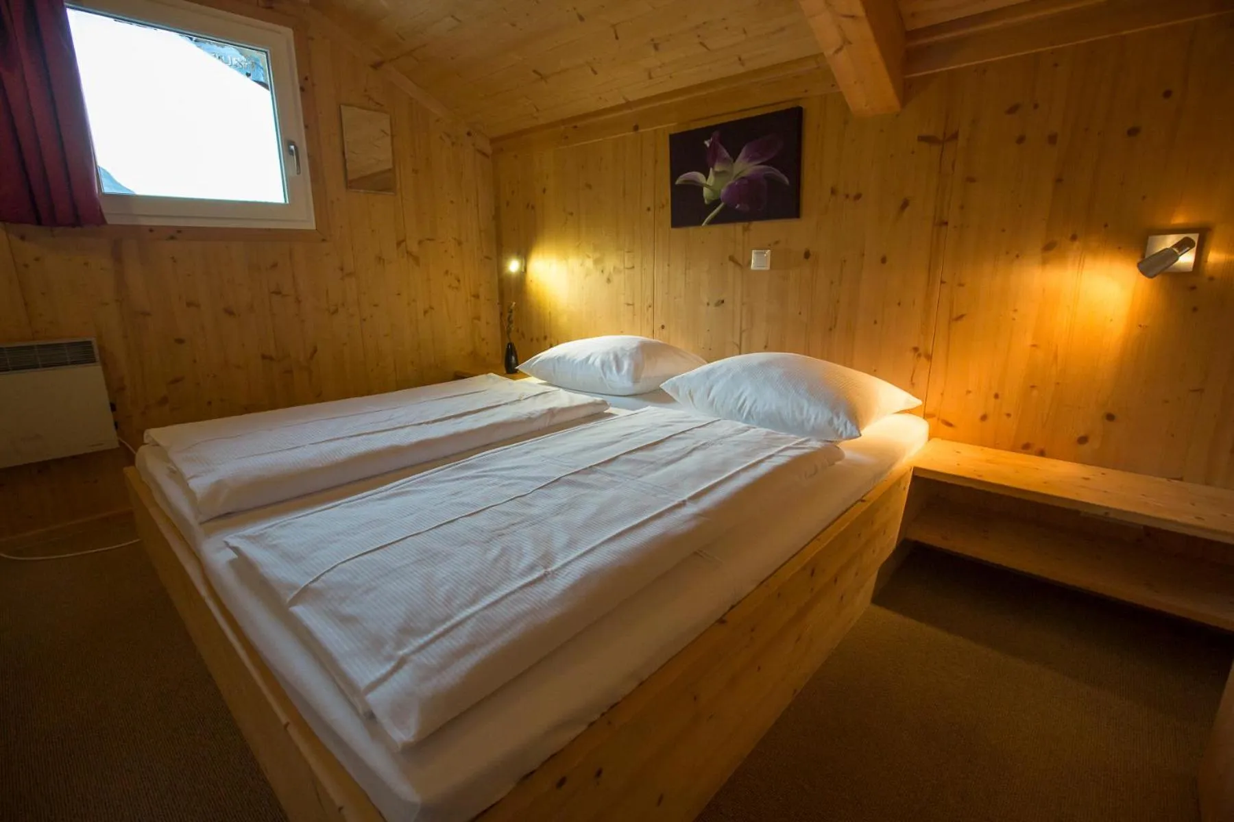 Bedroom, Bed in Alpendorf Dachstein West by ALPS RESORTS