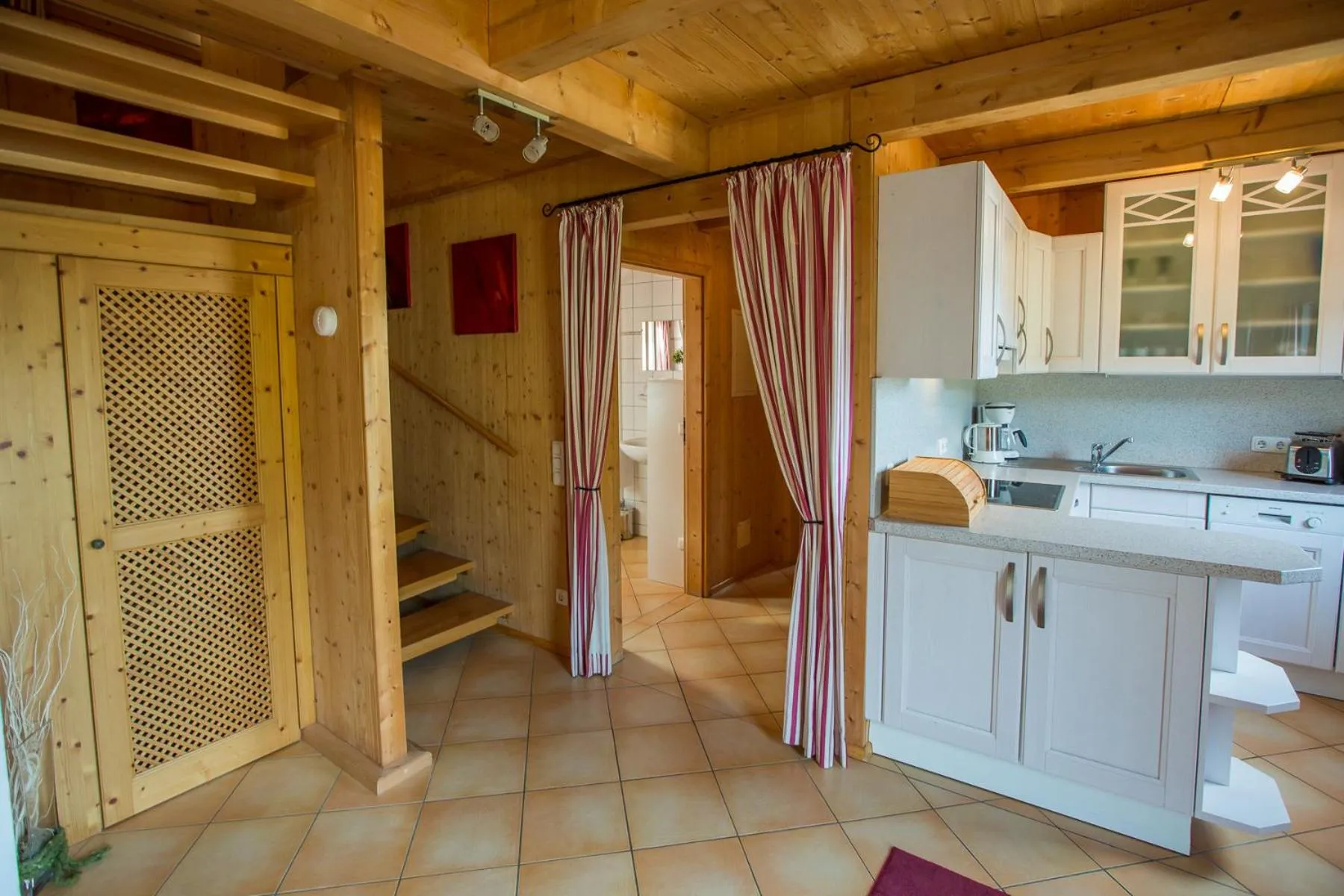 Kitchen or kitchenette in Alpendorf Dachstein West by ALPS RESORTS