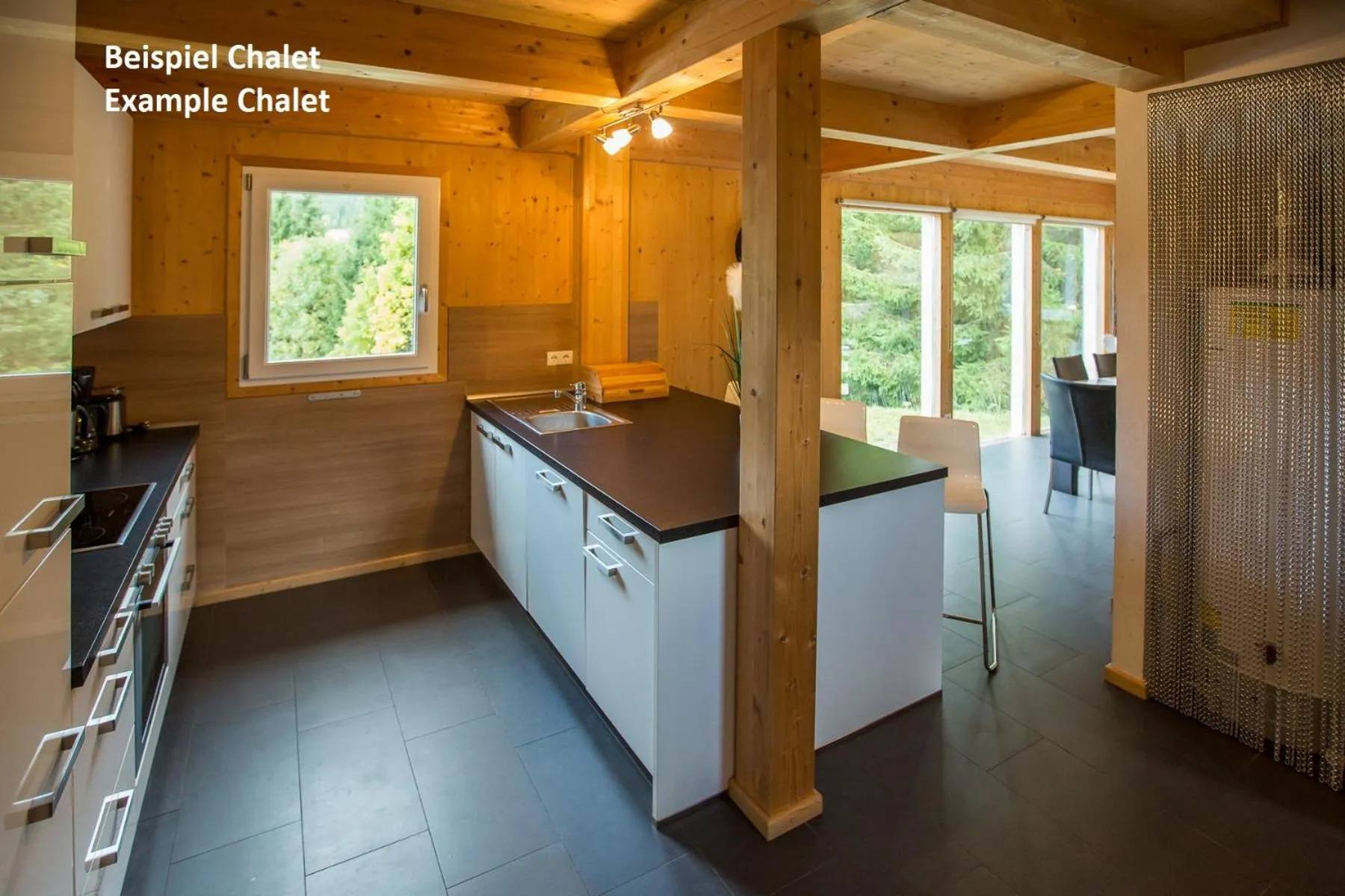 Kitchen or kitchenette in Alpendorf Dachstein West by ALPS RESORTS