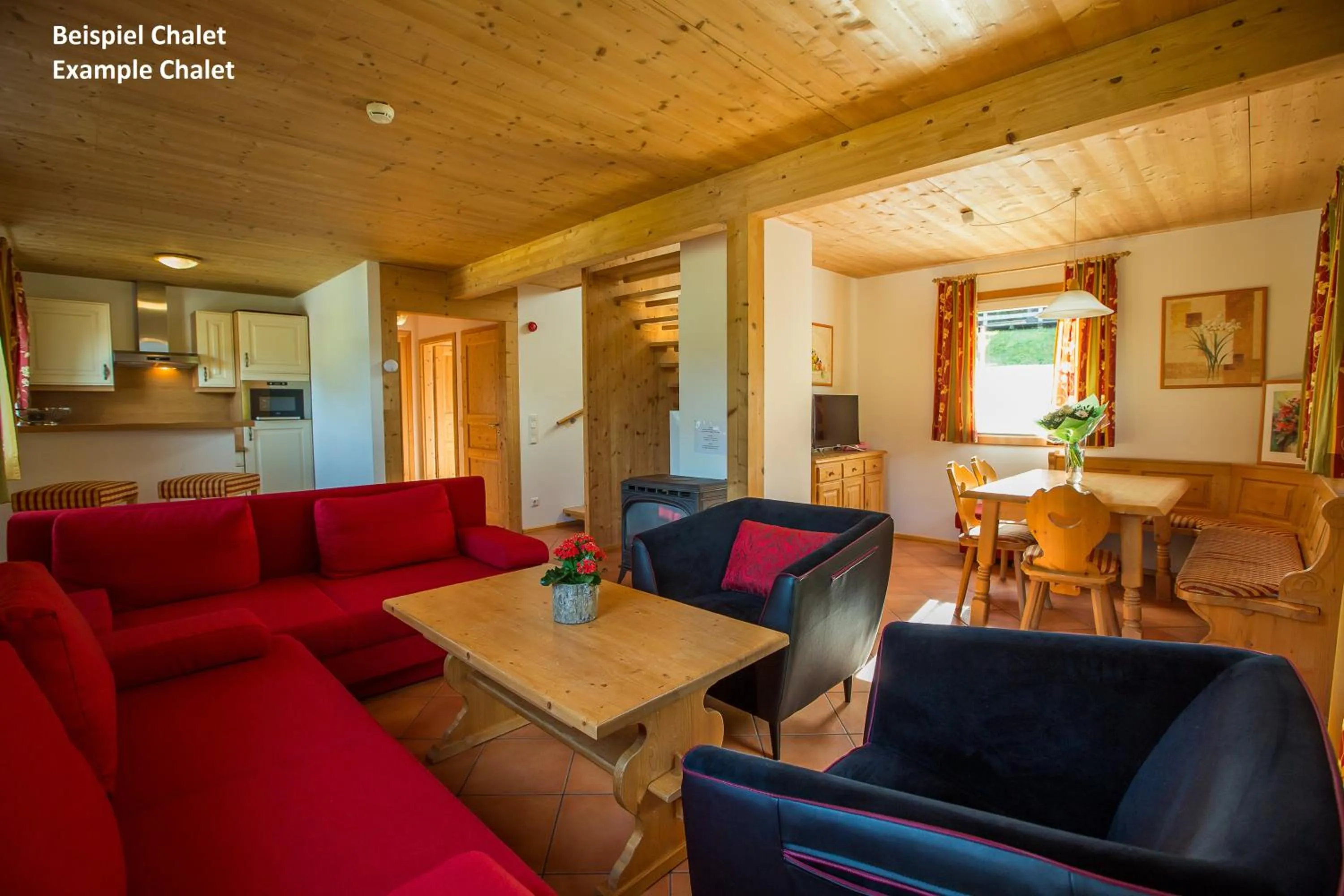 Living room in Alpendorf Dachstein West by ALPS RESORTS