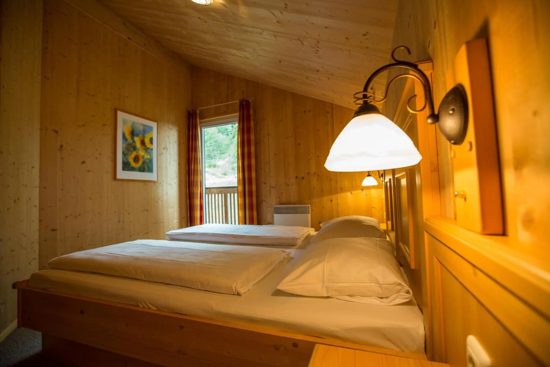 Bedroom, Bed in Alpendorf Dachstein West by ALPS RESORTS