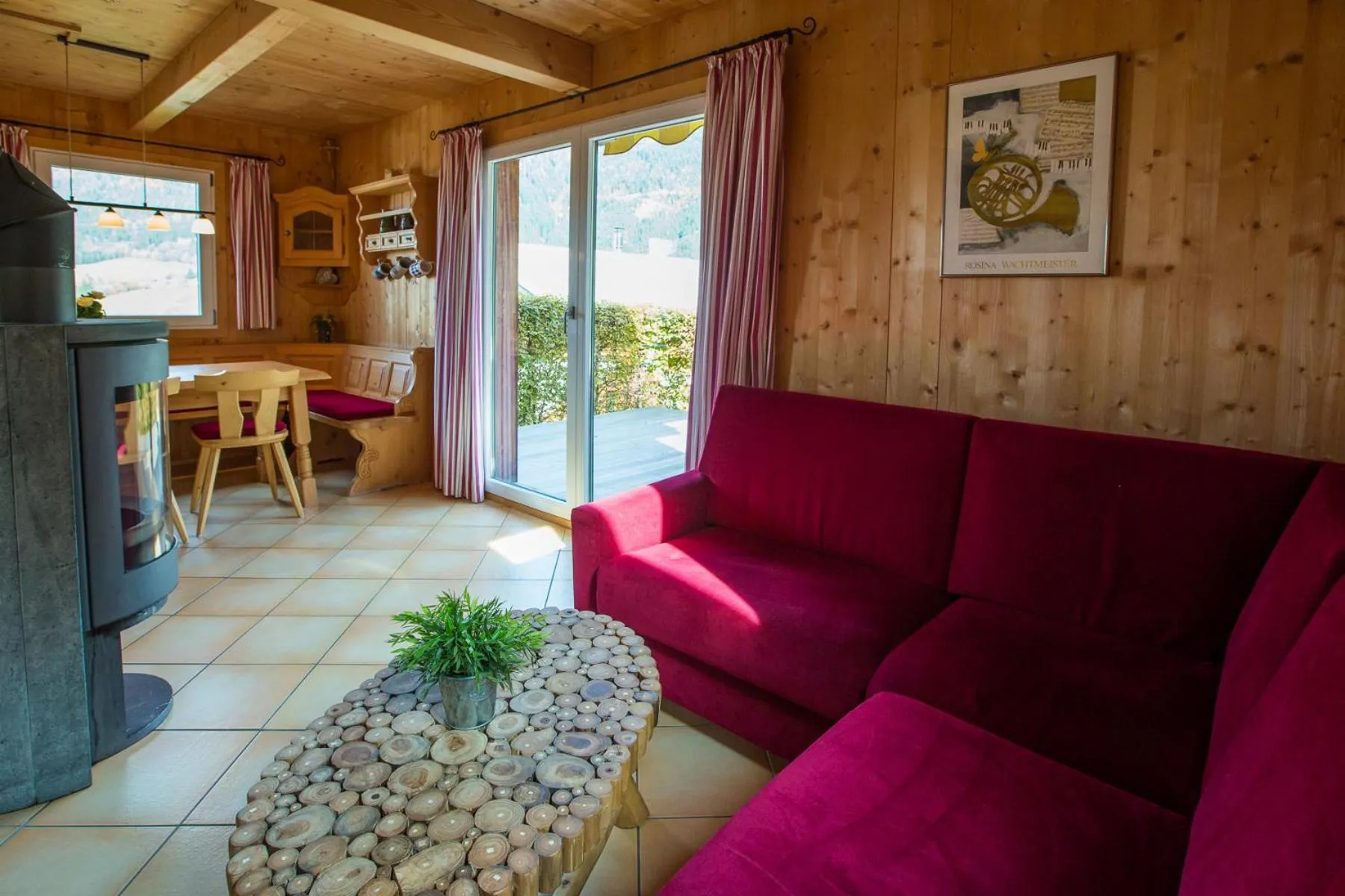 Living room in Alpendorf Dachstein West by ALPS RESORTS