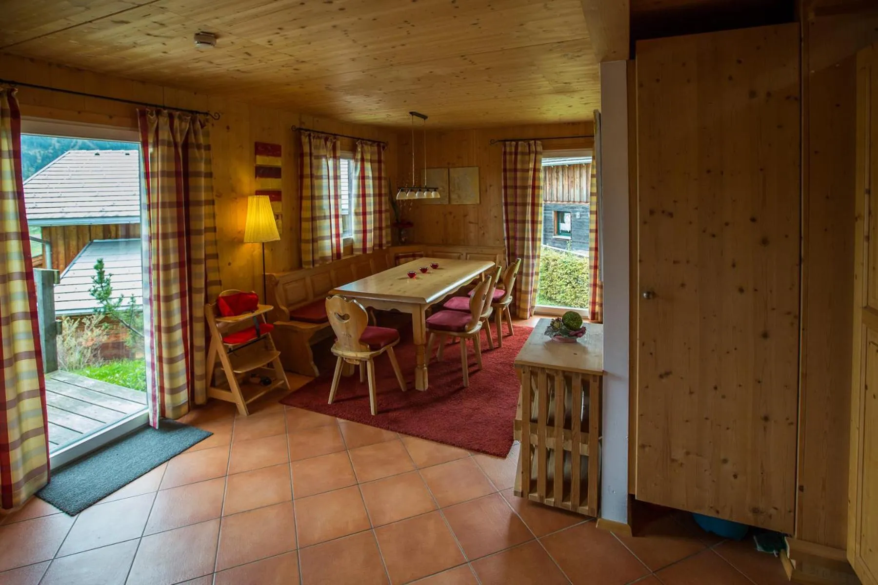 Dining area in Alpendorf Dachstein West by ALPS RESORTS